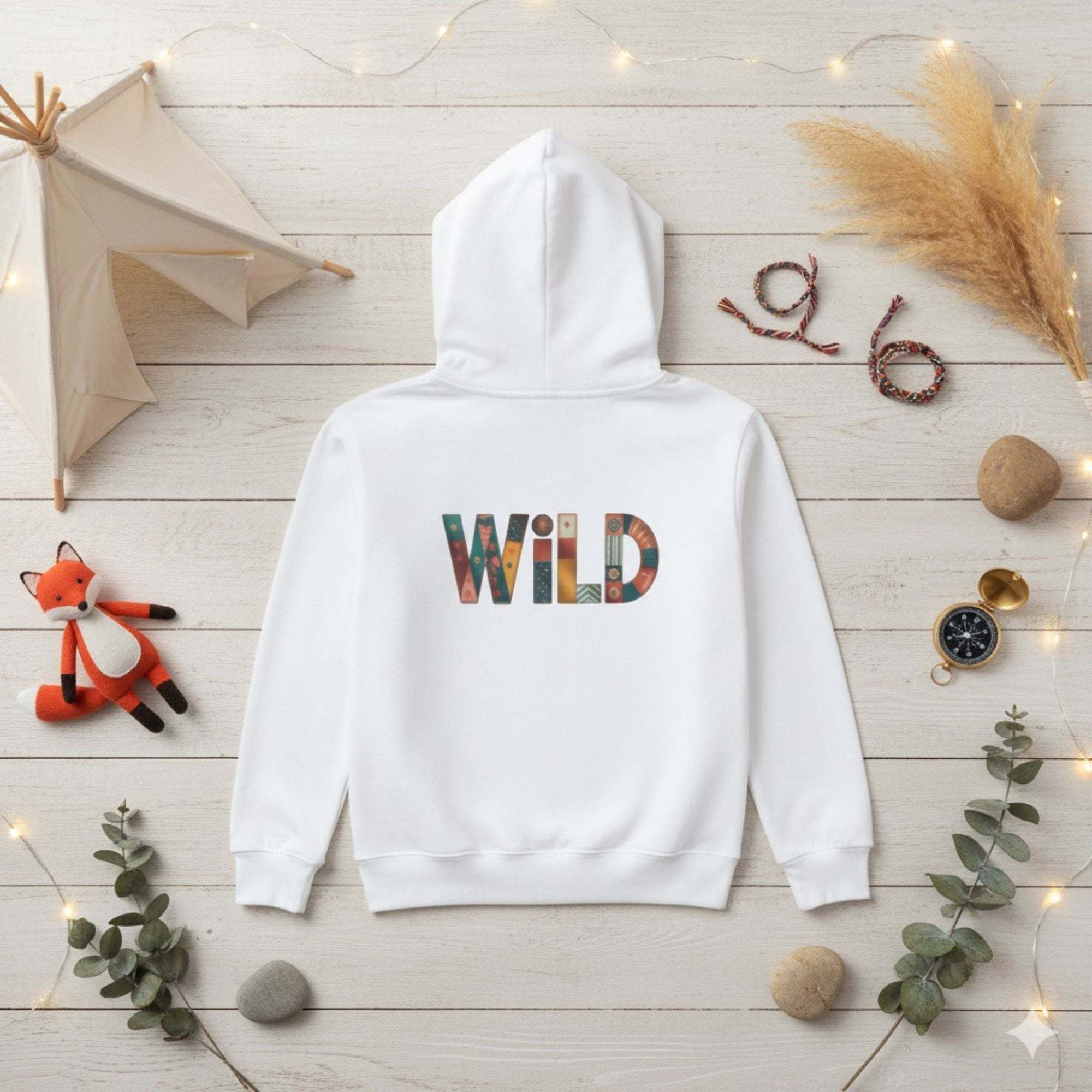 White Patchwork Wild Word Hoodie for children with colorful "WiLD" text on back and kangaroo pocket