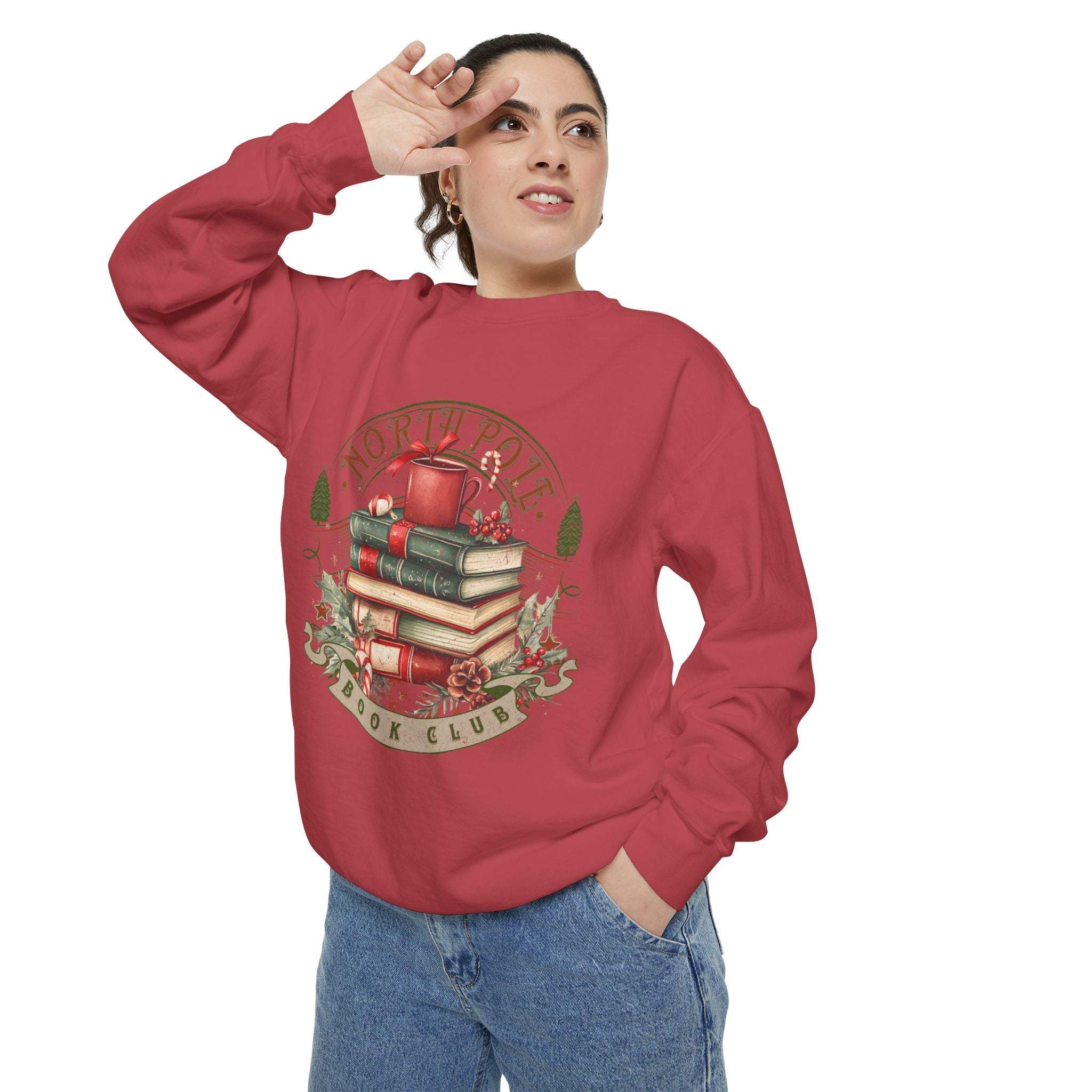 Woman wearing vintage North Pole book club red sweatshirt with book and holiday design
