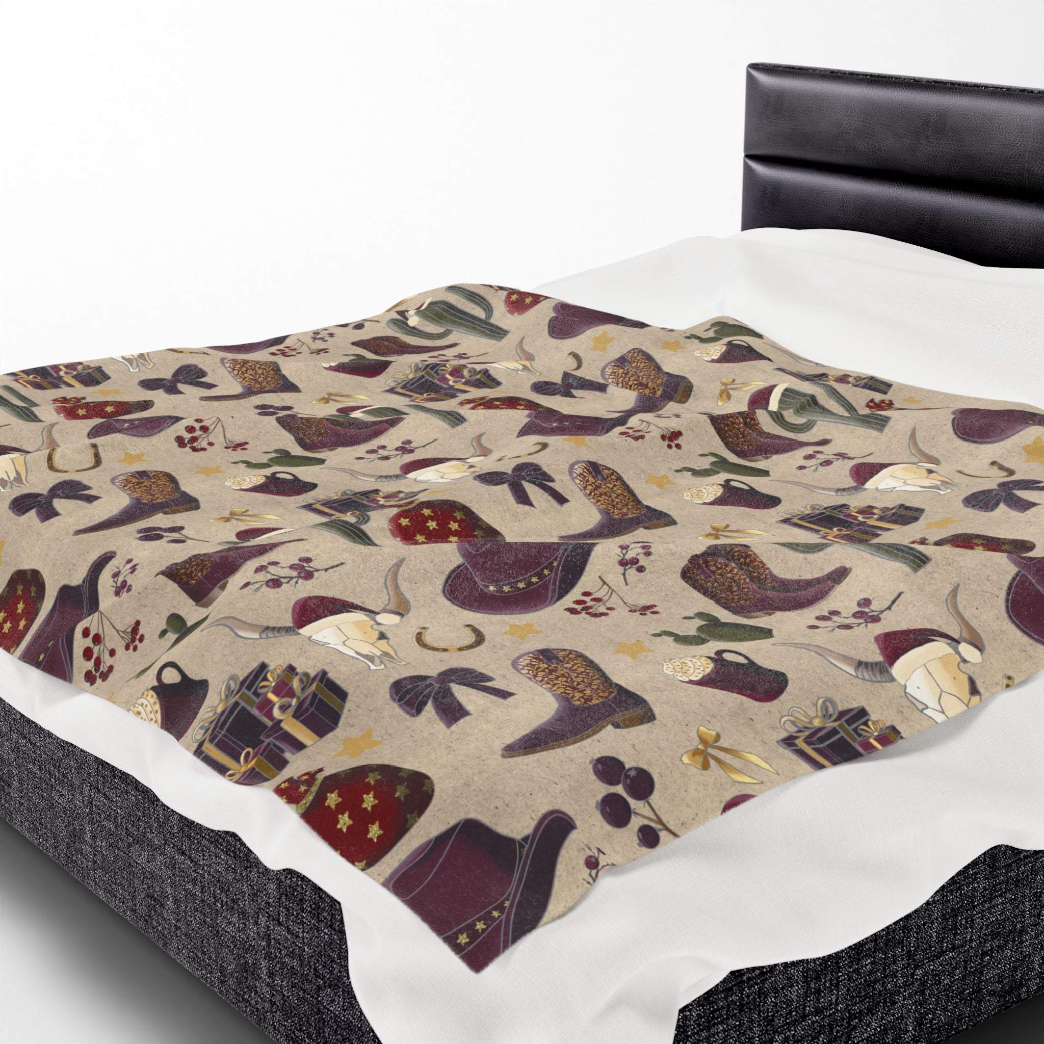 Cowboy Christmas plush blanket with festive western design on bed