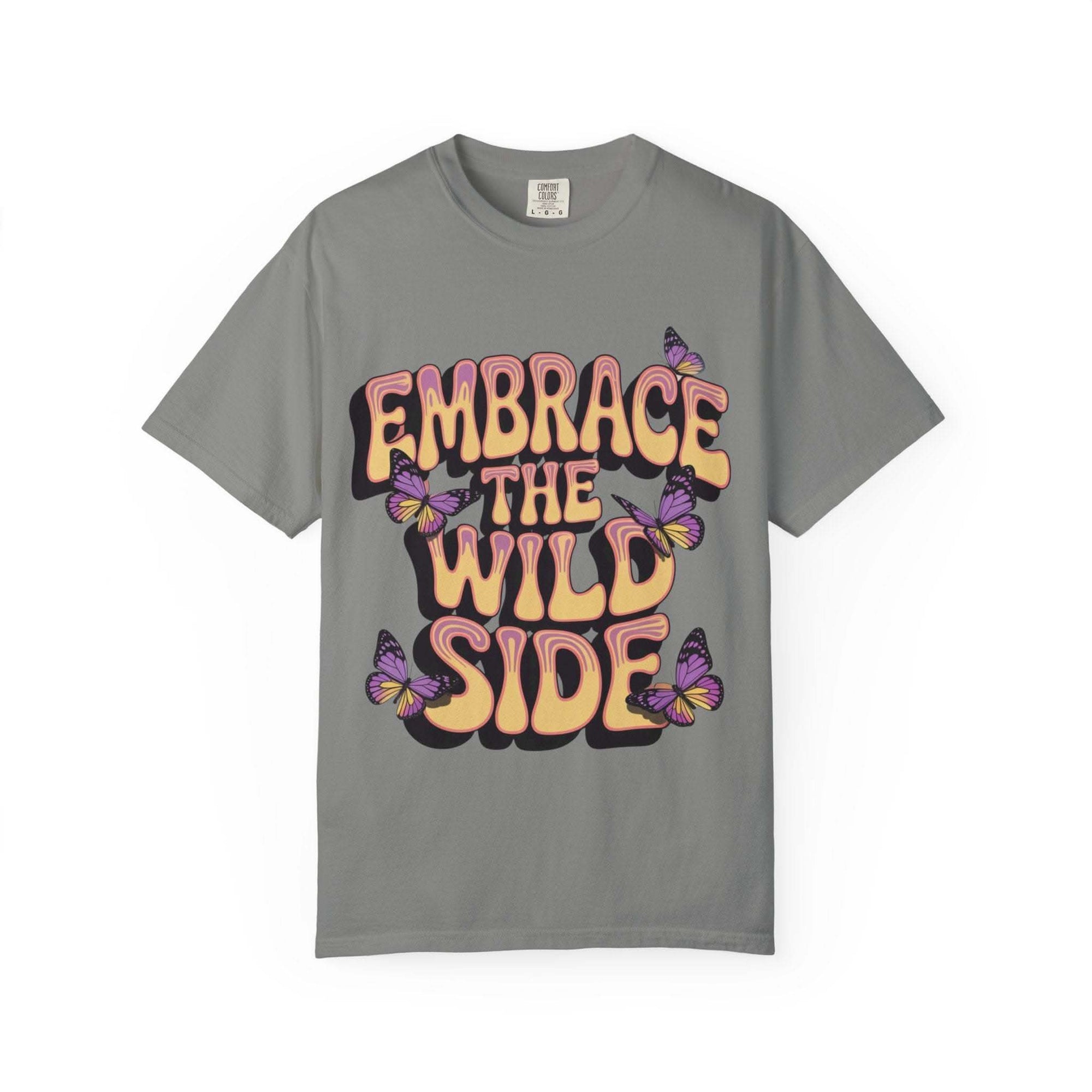 gray garment-dyed T-shirt with "Embrace the Wild Side" text and purple butterflies graphic