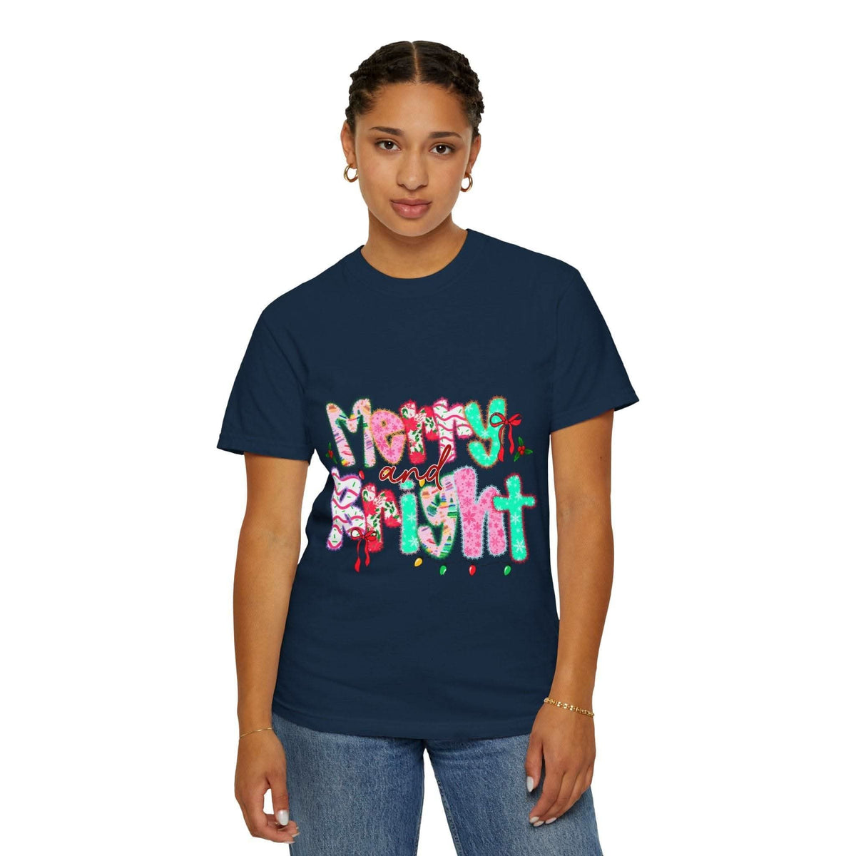 Woman wearing navy Merry and Bright T-shirt with colorful festive lettering on front