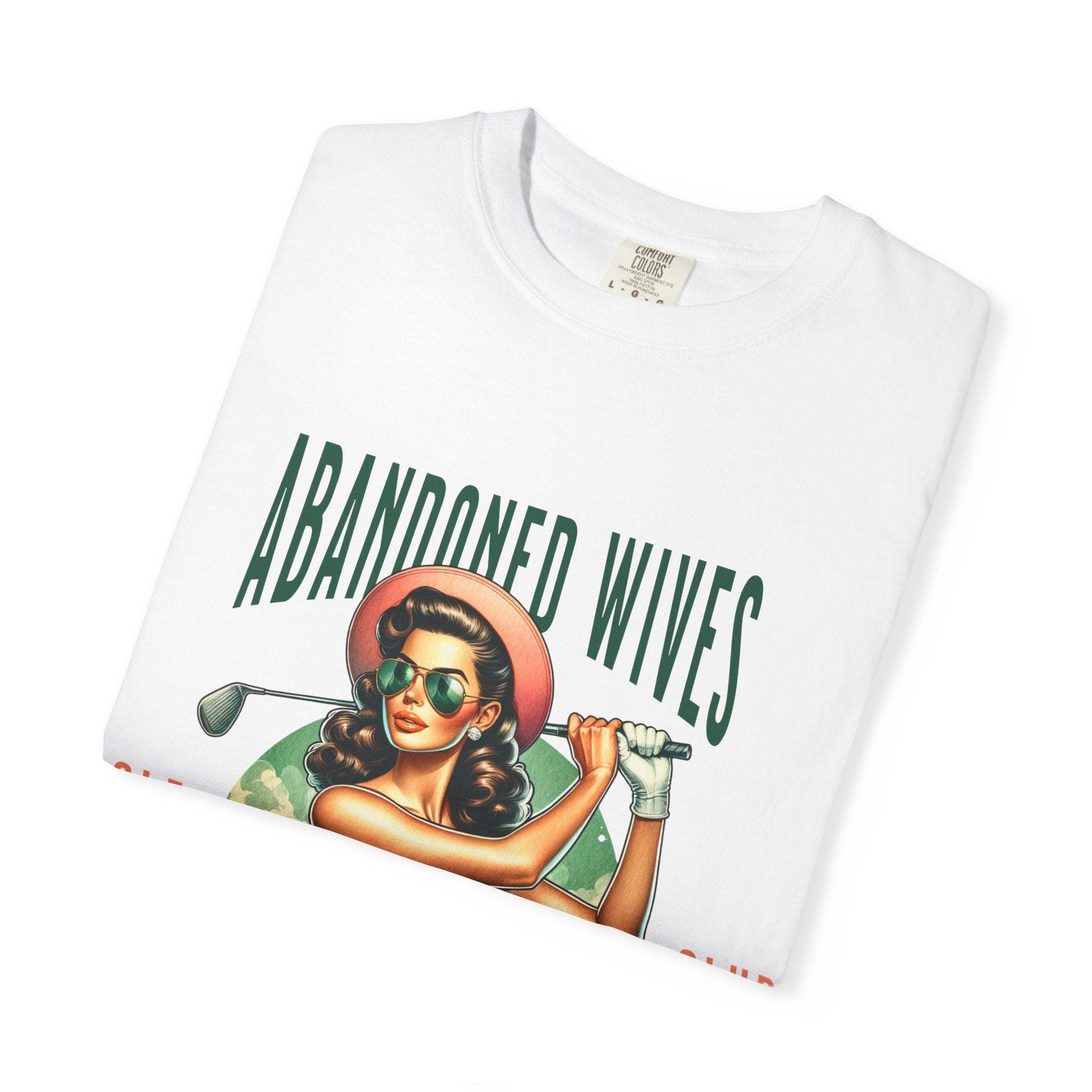 Vintage Unisex T-shirt with humorous Abandoned Wives Golf Club design featuring a retro woman golfer on white cotton fabric