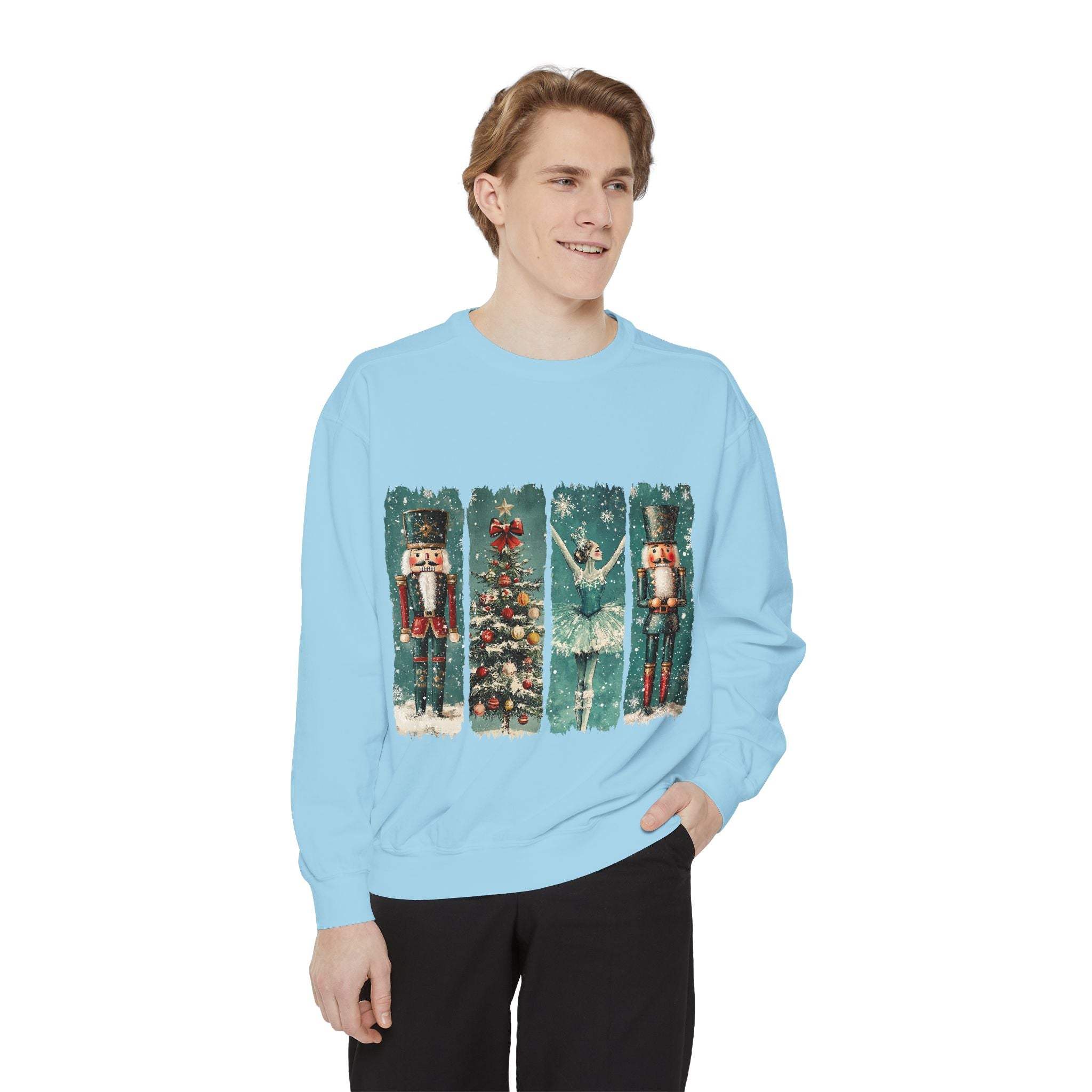 Man wearing light blue vintage Christmas nutcracker sweatshirt with holiday-themed watercolor print