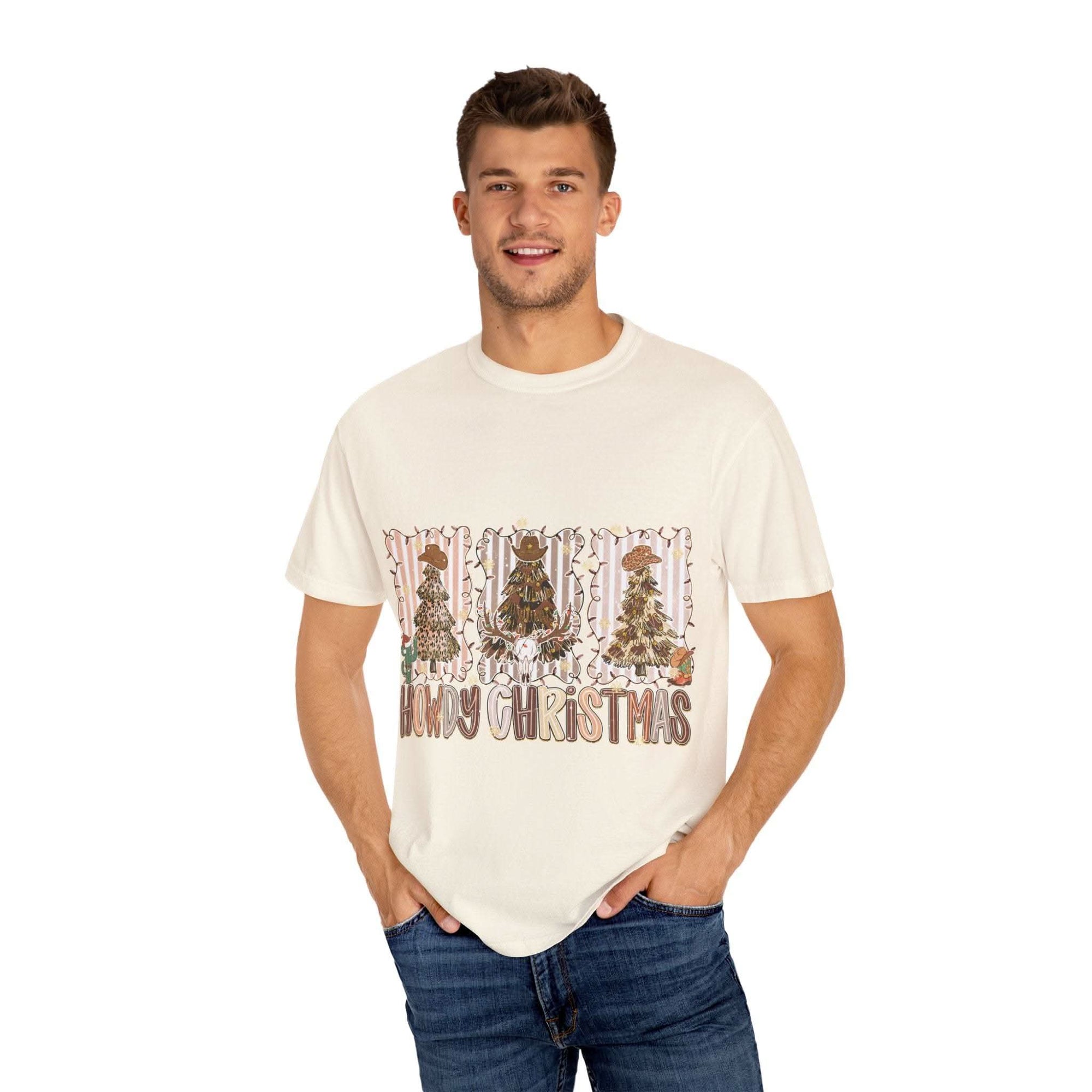 Cowboy Howdy Christmas t-shirt with festive cowboy design in cream color worn by man