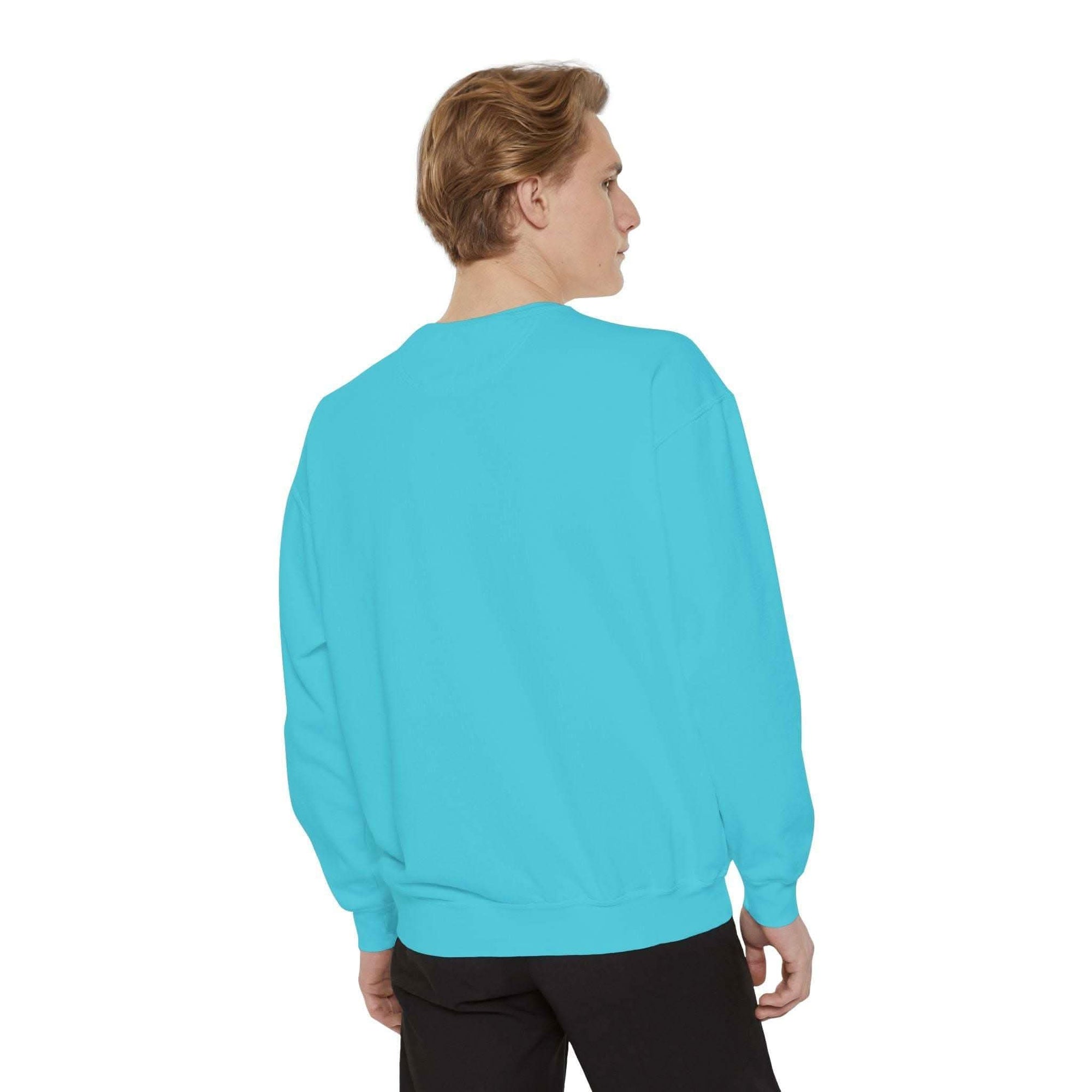 Man wearing blue Vintage Varsity Merry Christmas sweatshirt from back view