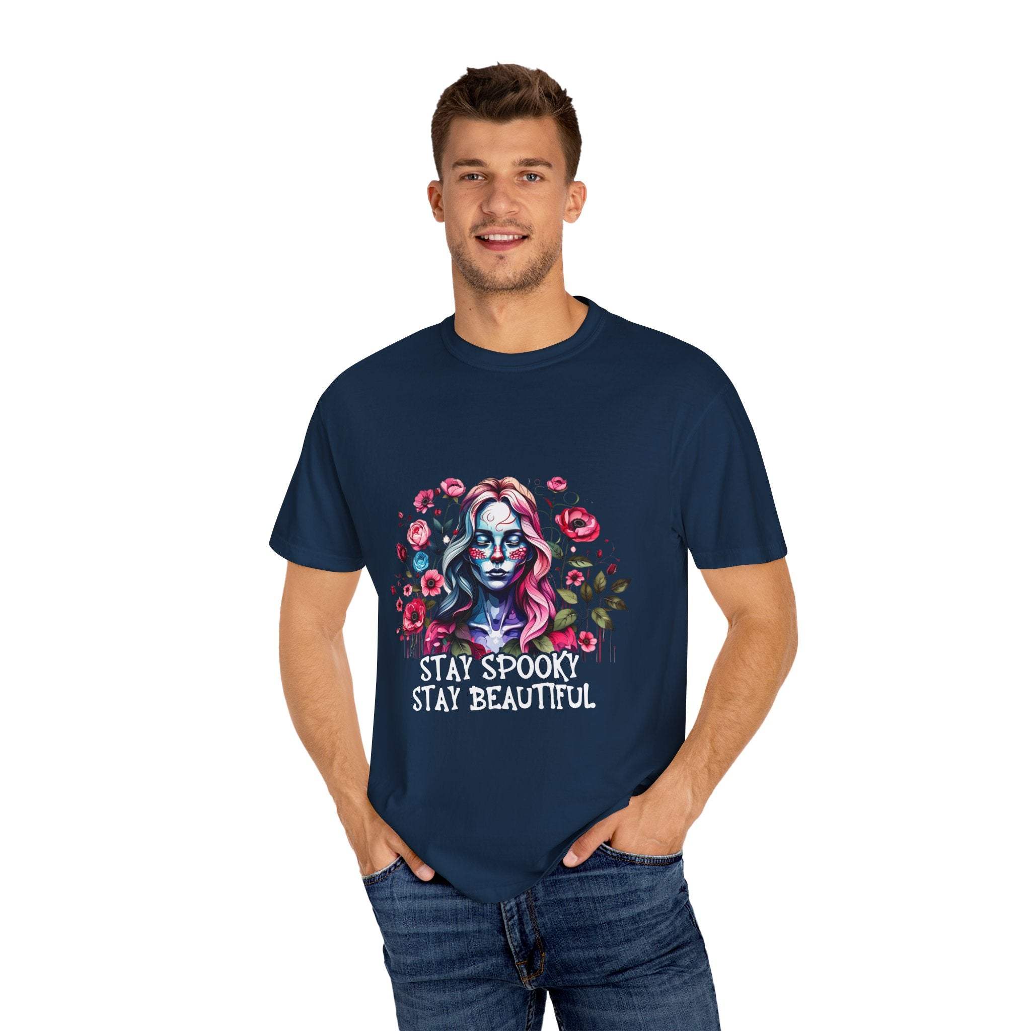Man wearing navy floral skeleton t-shirt with "Stay Spooky Stay Beautiful" text, relaxed fit.