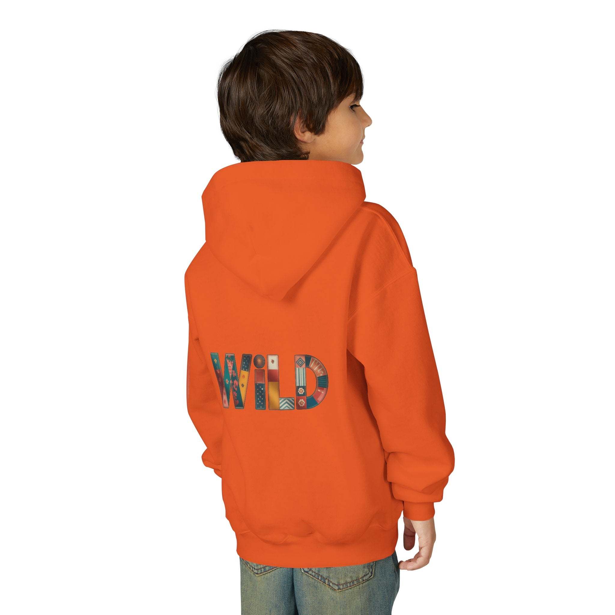 Child wearing orange Patchwork Wild Word Hoodie with colorful "WILD" text on back