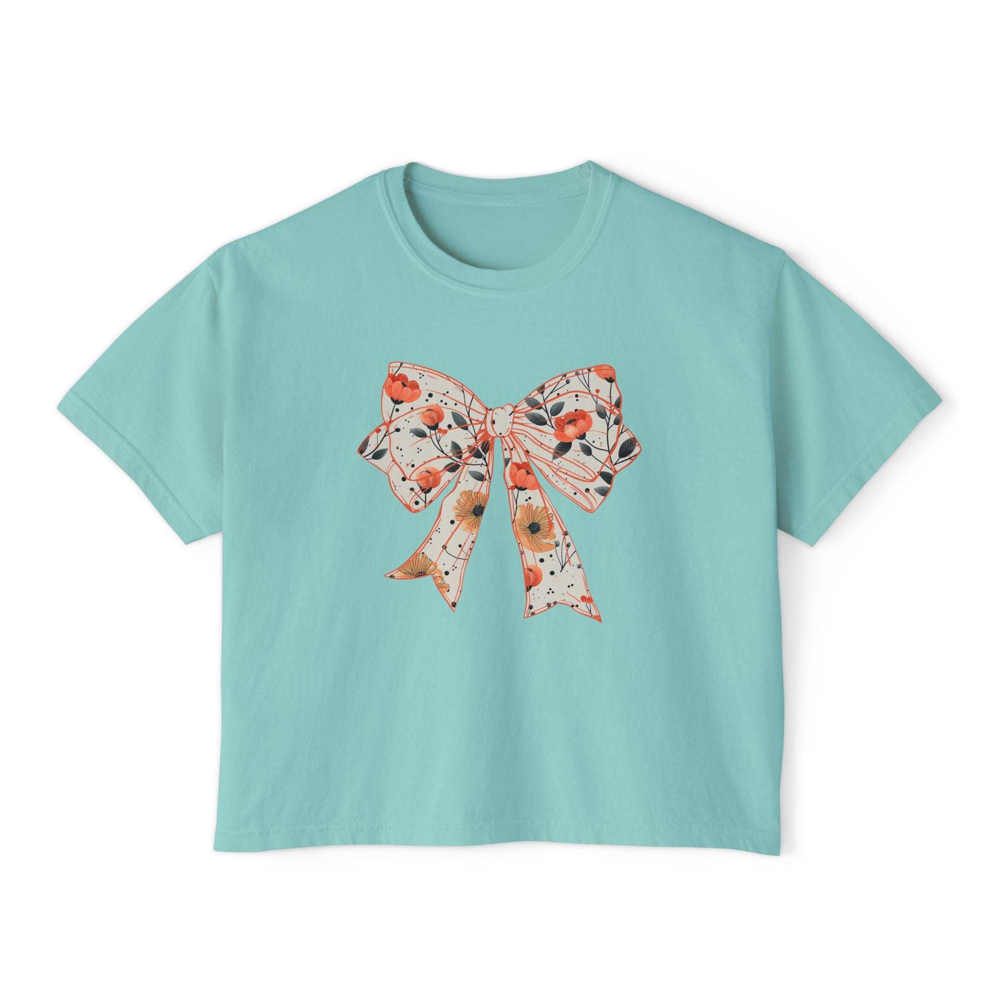 Floral coquette bow design women's tee in butter color, boxy fit, made from vintage cotton by Printify.