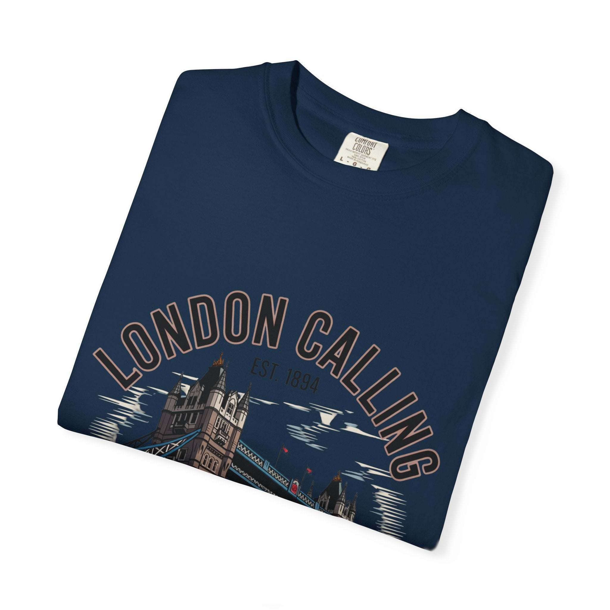 Navy blue London Calling Travel T-shirt with Tower Bridge graphic, unisex garment-dyed cotton tee for travel enthusiasts