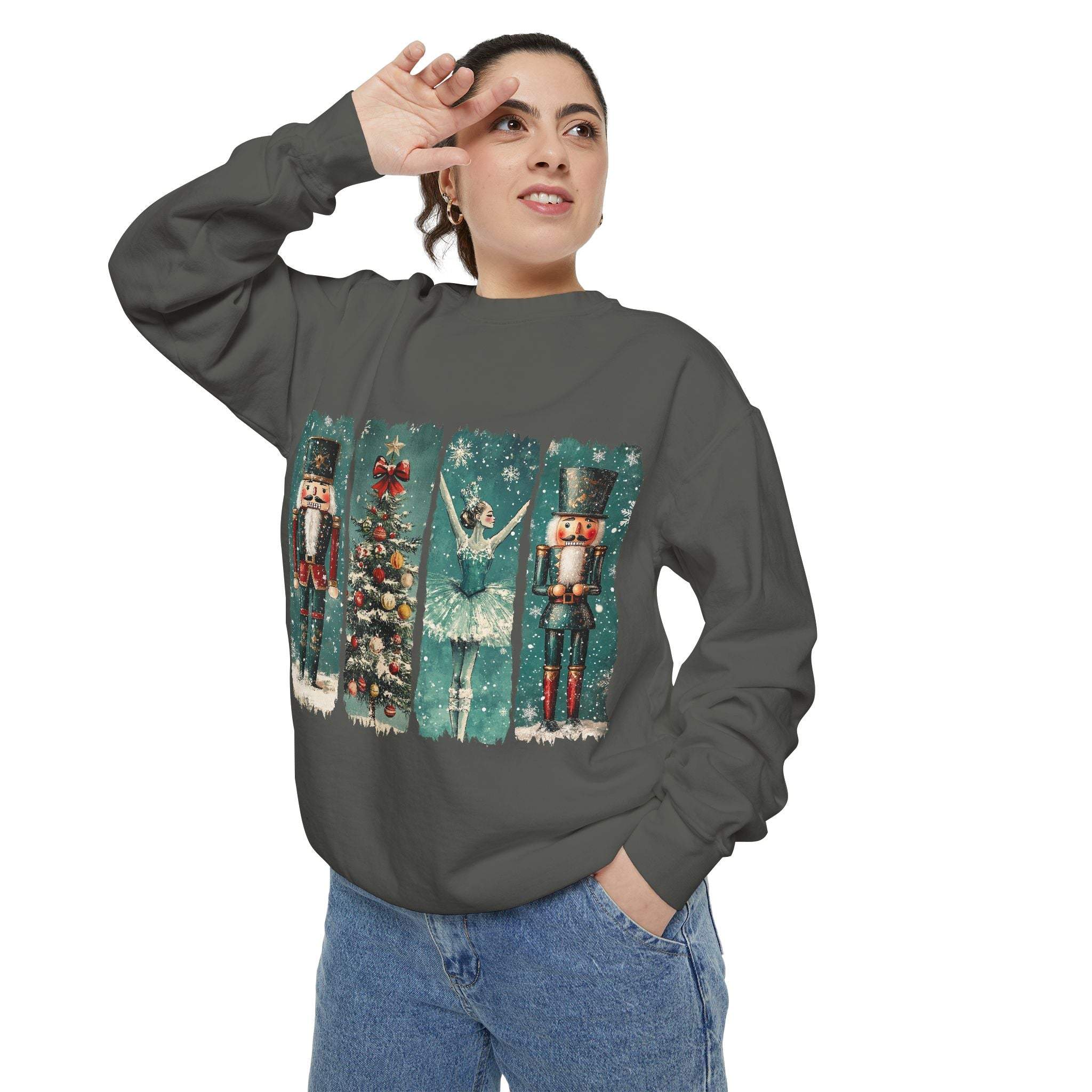Woman wearing vintage Christmas nutcracker sweatshirt with watercolor nutcracker and ballerina design