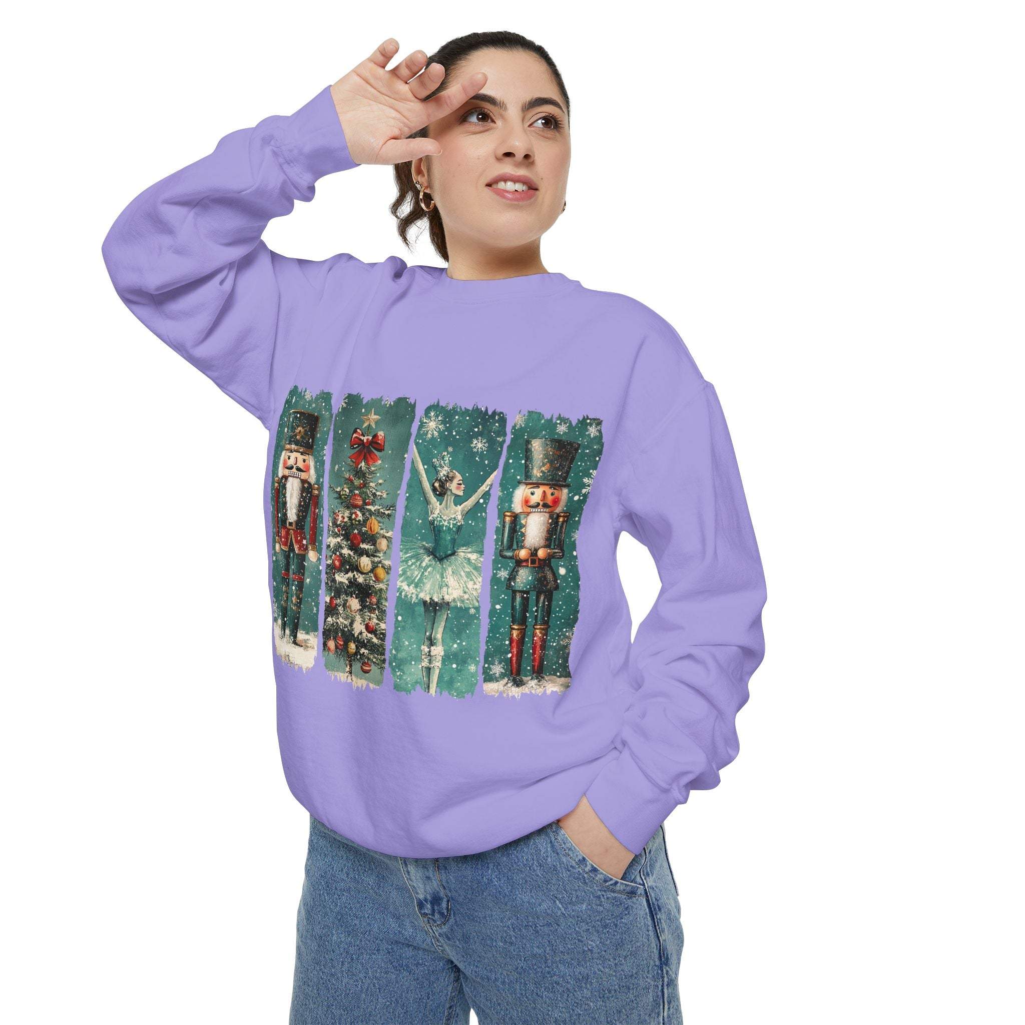 Woman wearing a vintage Christmas nutcracker watercolor sweatshirt in purple with festive holiday design