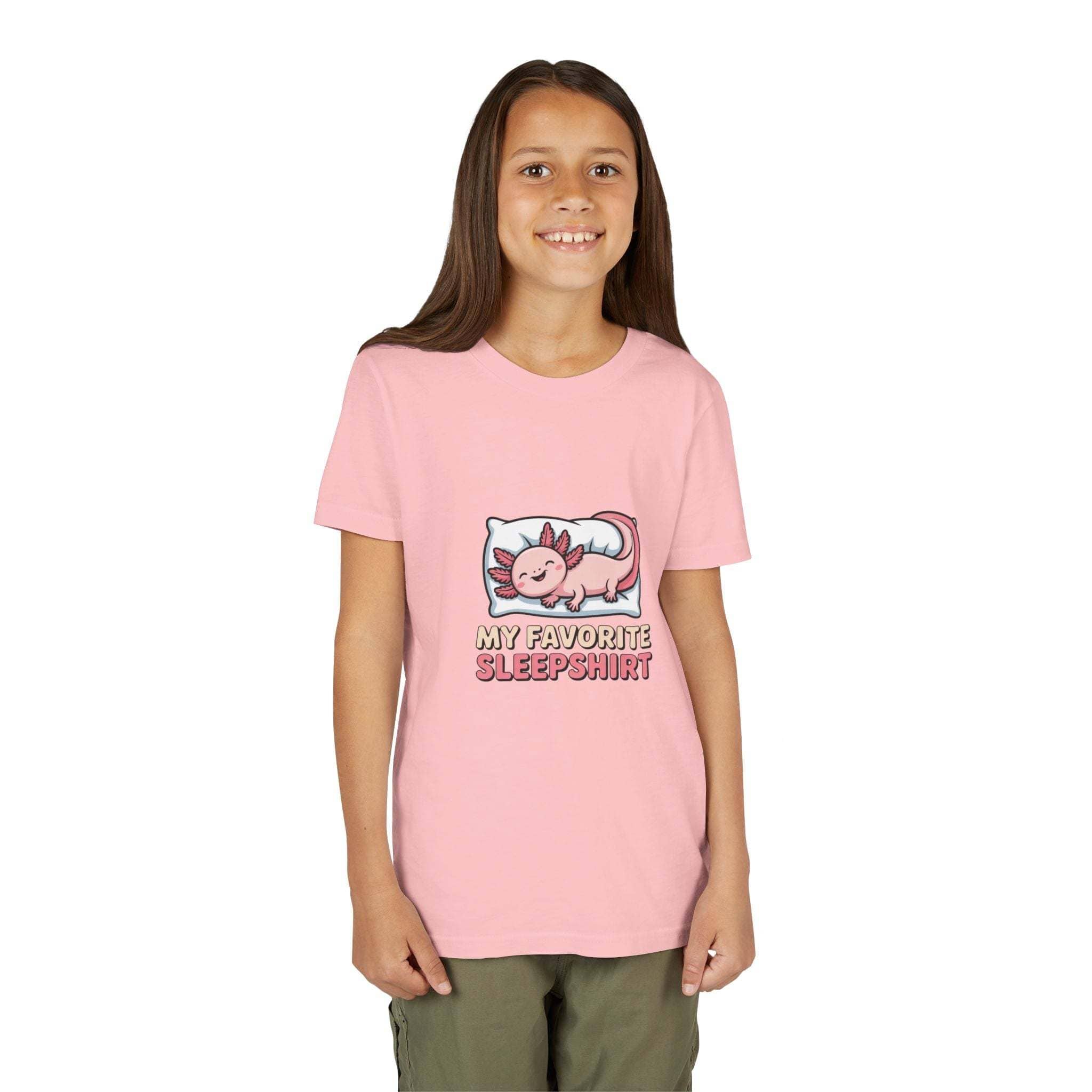 Girl wearing a pink t-shirt with a cartoon character and text on a white background