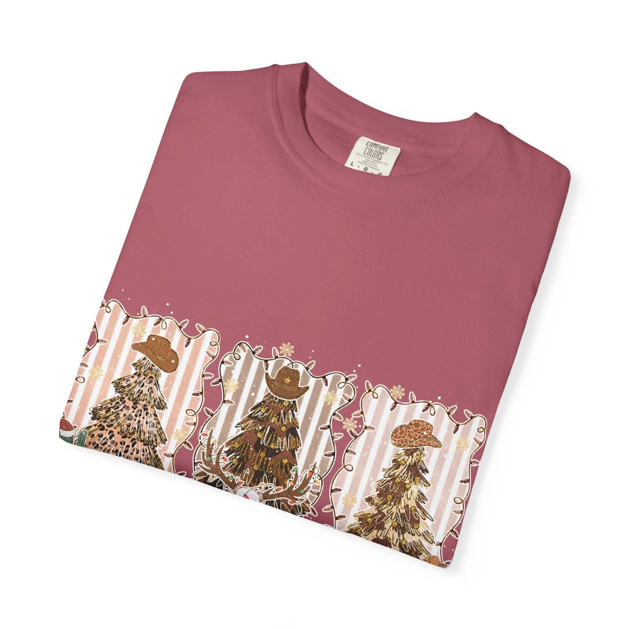 Cowboy Howdy Christmas t-shirt with festive cowboy tree design on mauve background