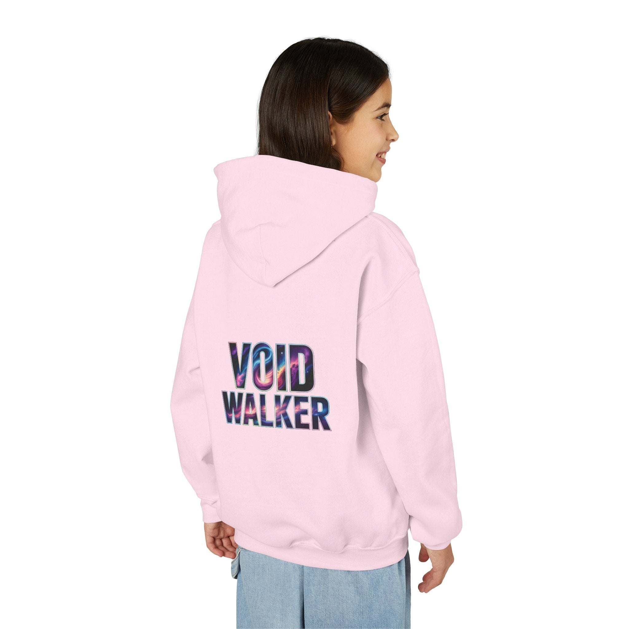Kid wearing pink galaxy hoodie with "Void Walker" galaxy print on back