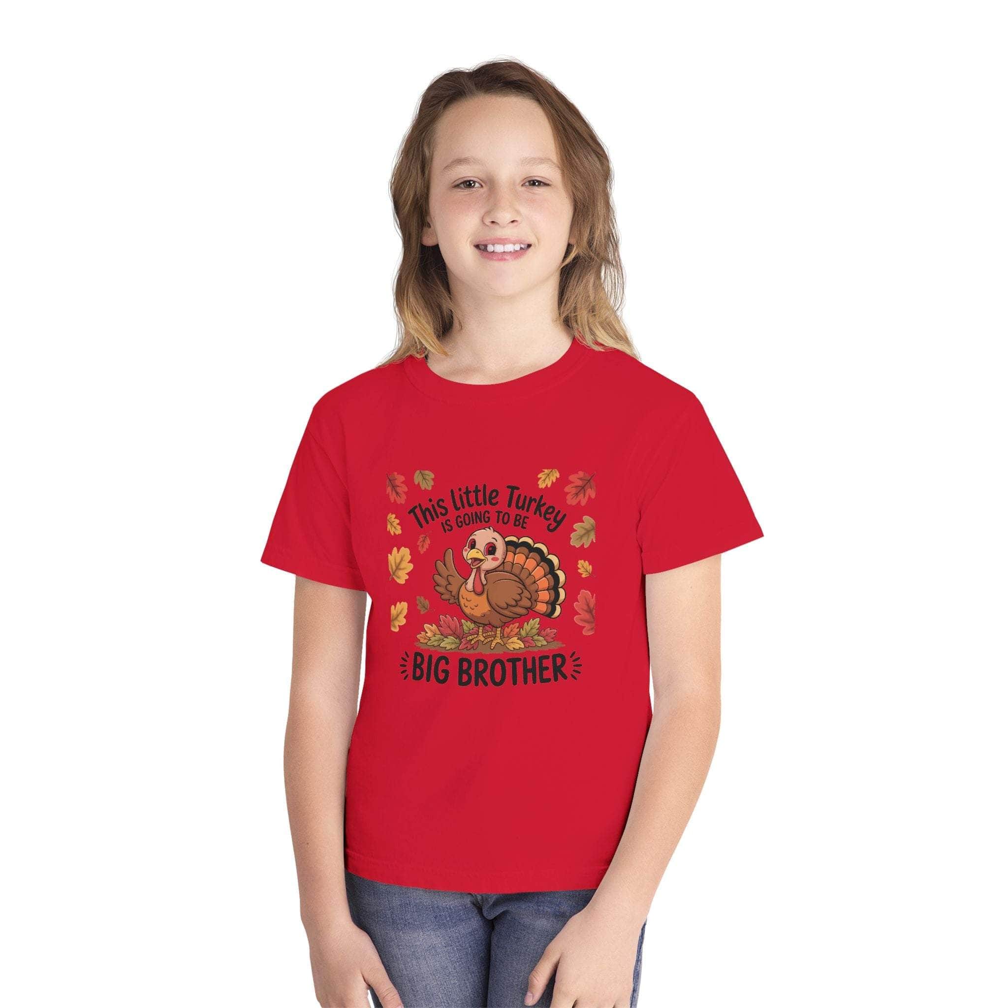 Youth tee Big Brother Thanksgiving announcement shirt with turkey design on red cotton fabric worn by child model