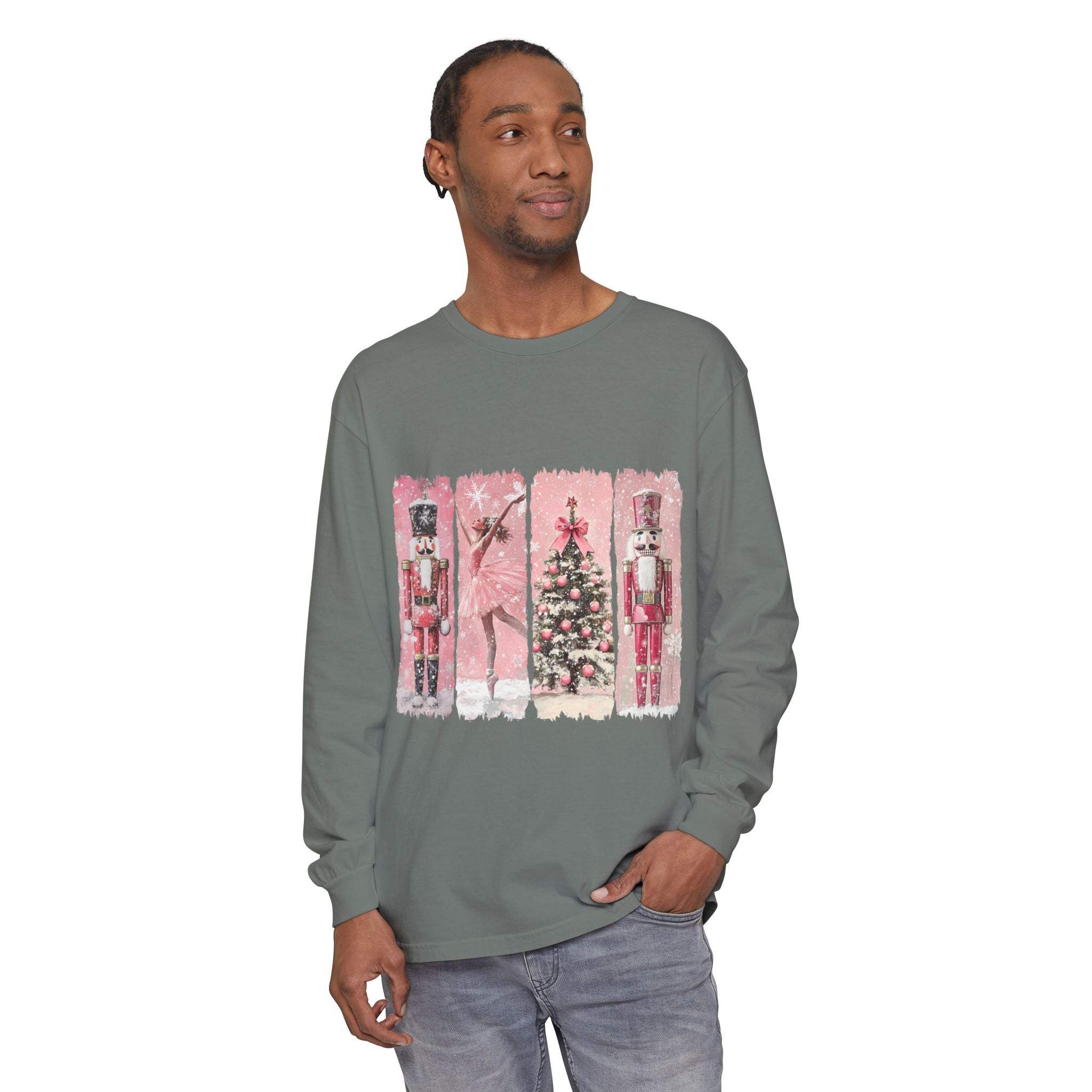 Man wearing long sleeve t-shirt with preppy pink Nutcracker Christmas watercolor design