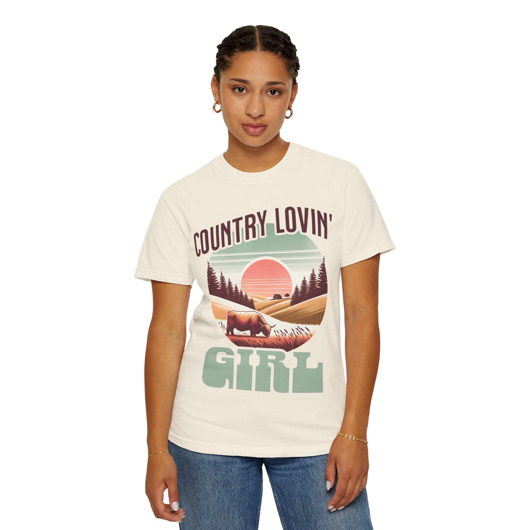 Country Lovin Girl T-shirt featuring vintage rural landscape and buffalo design on cream cotton tee for country music fans