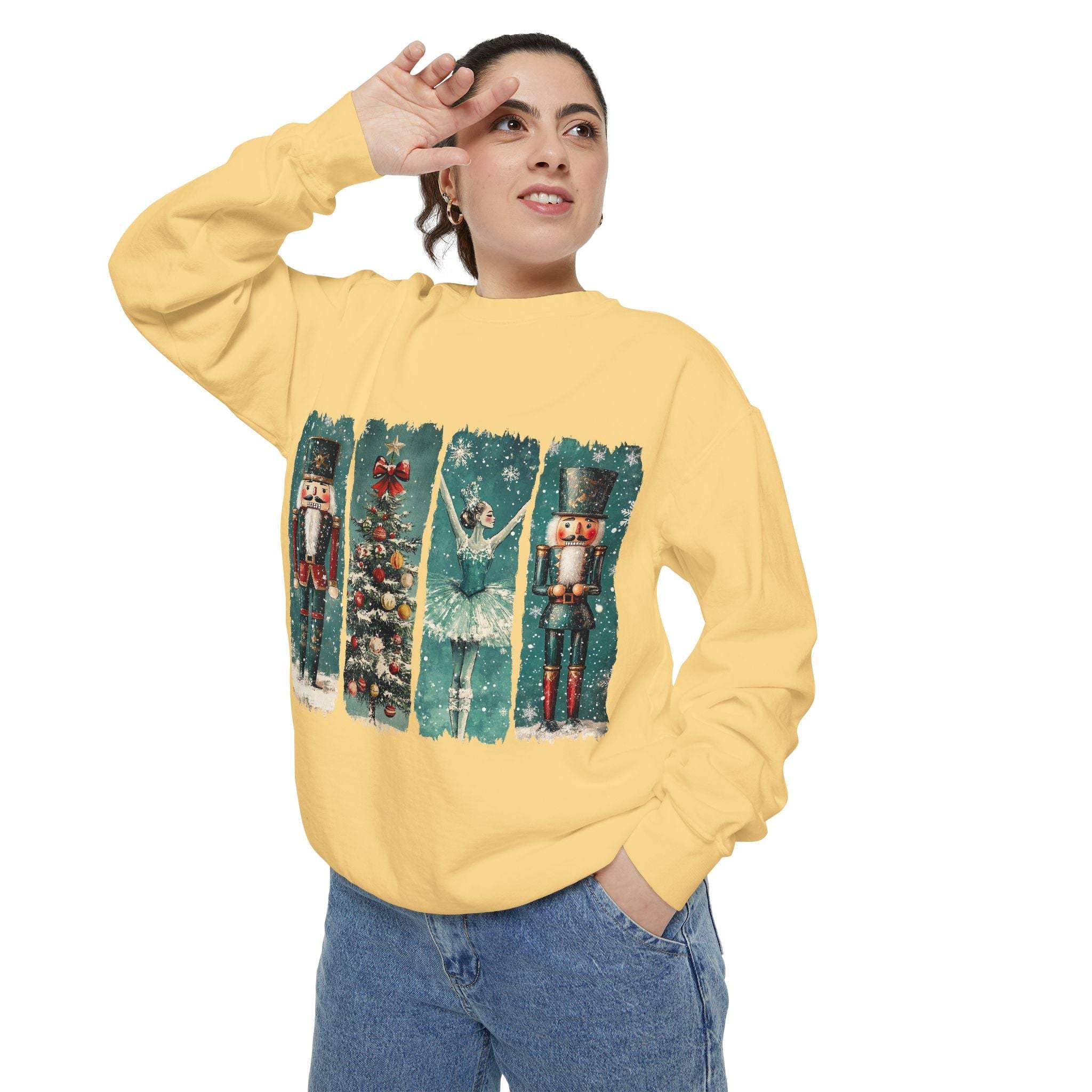 Vintage Christmas Nutcracker sweatshirt with watercolor nutcracker and holiday design on yellow cozy fabric