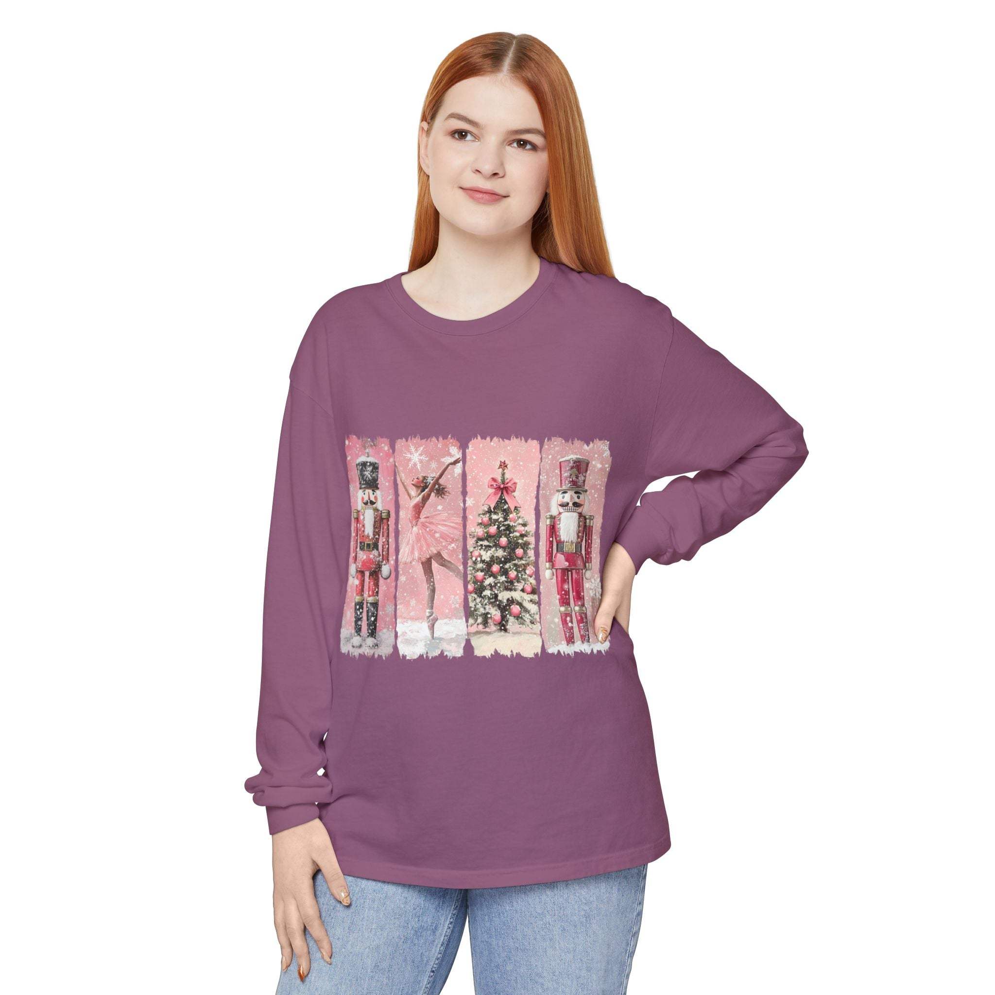 Woman wearing preppy pink watercolor Nutcracker Christmas long sleeve T-shirt