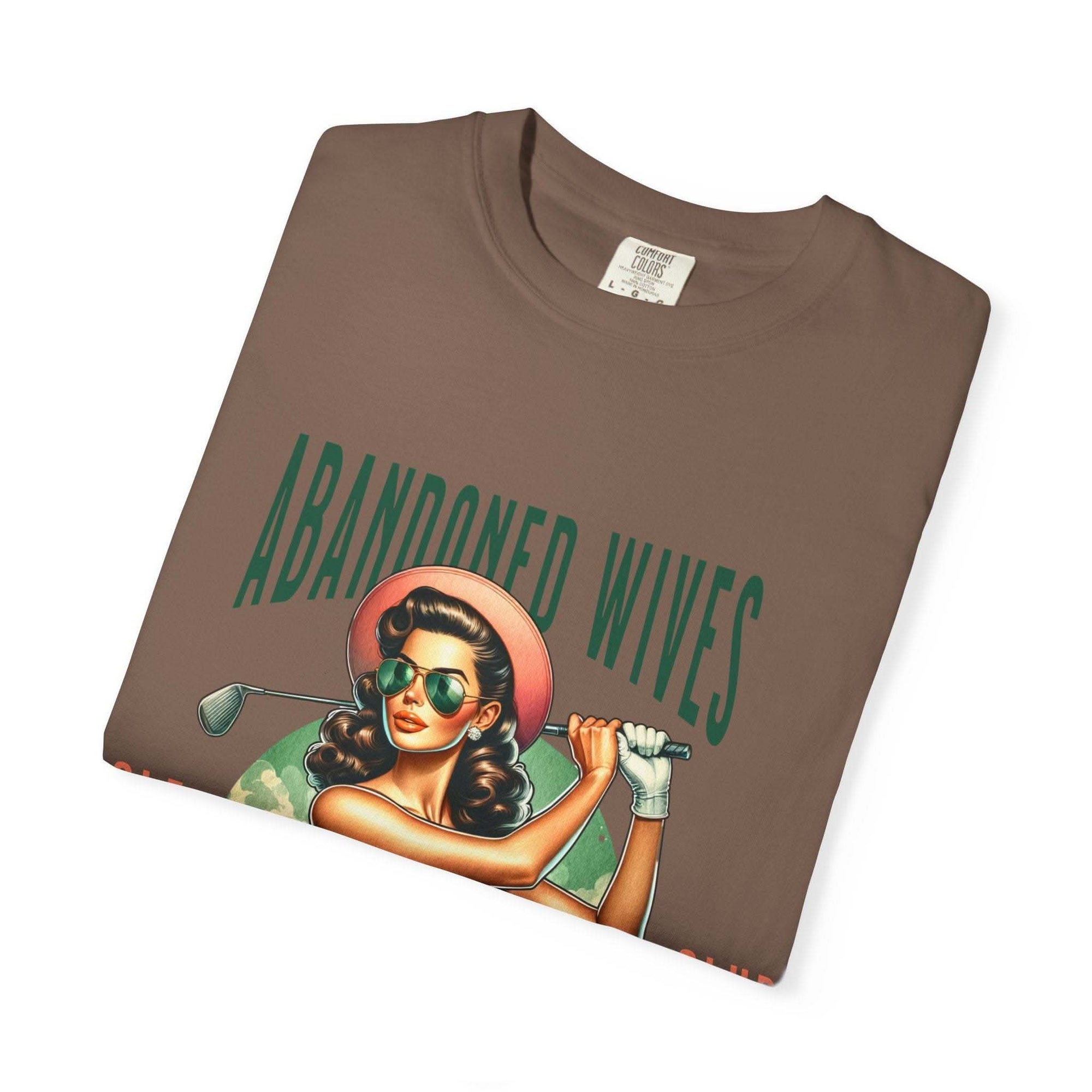 Vintage unisex t-shirt with humorous Abandoned Wives Golf Club design, soft garment-dyed cotton in brown