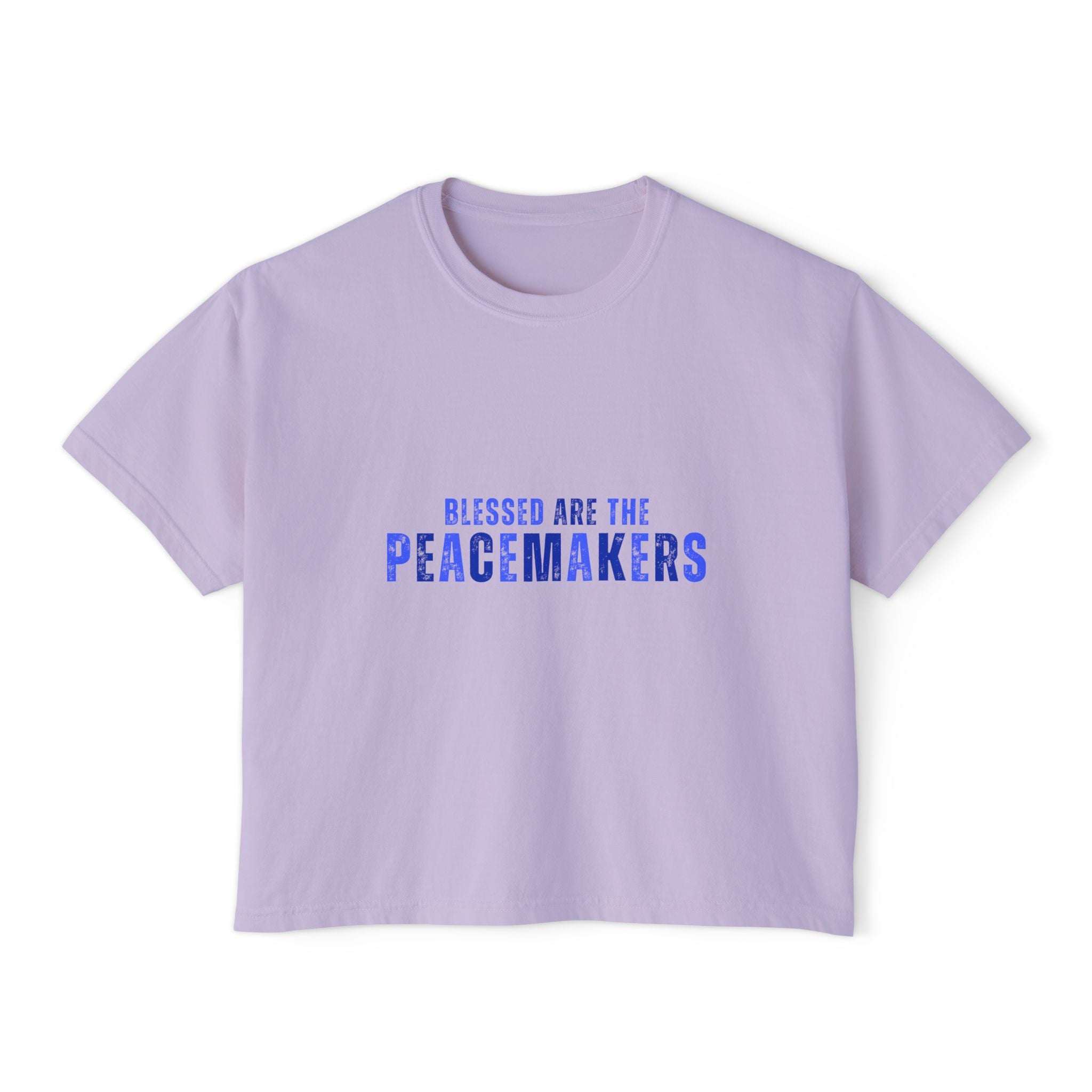 Light purple women's boxy tee with "Blessed be the Peacemakers" text in blue, vintage pigment dye, 100% cotton