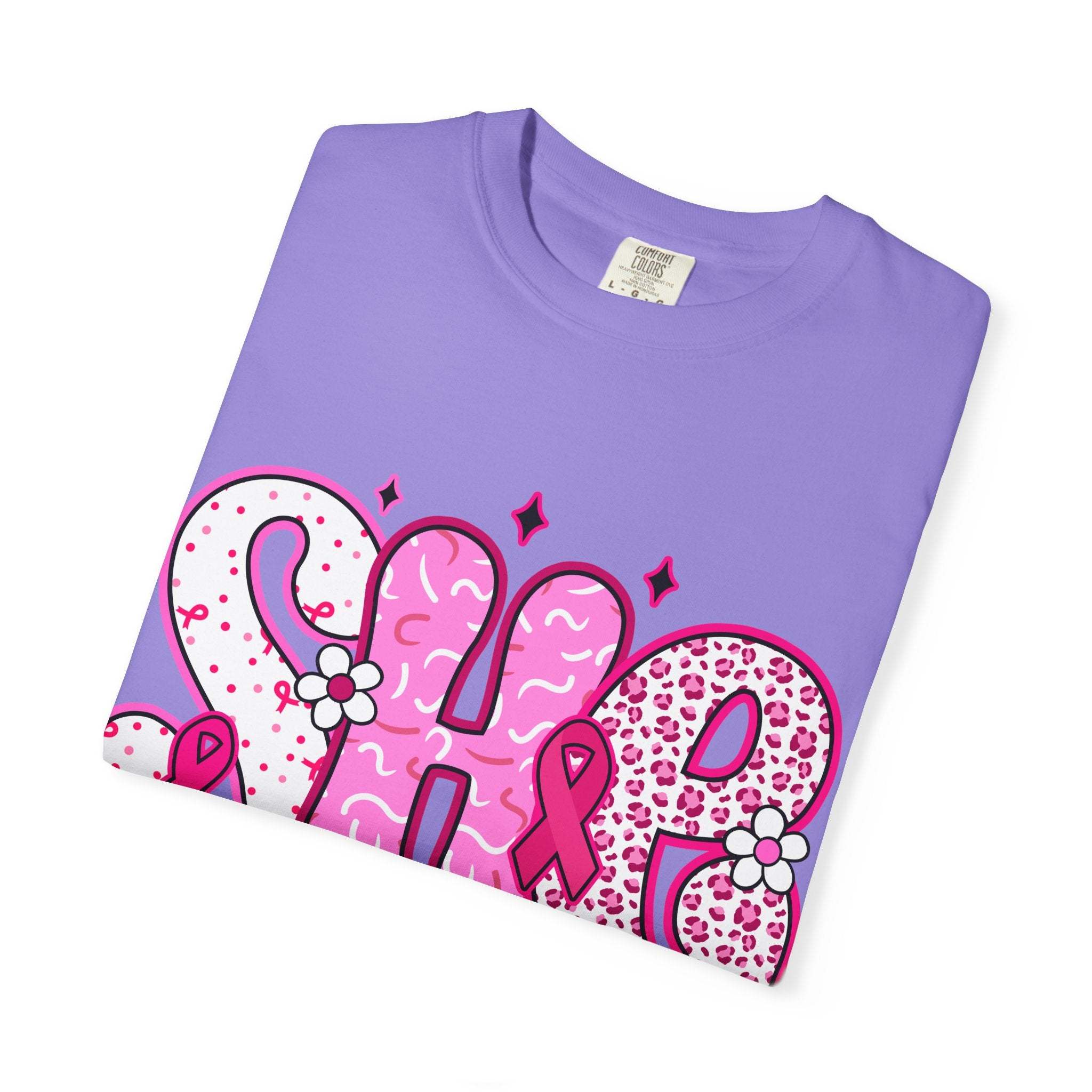Purple Fighter Breast Cancer T-shirt with pink ribbon and decorative lettering design, unisex cotton garment.