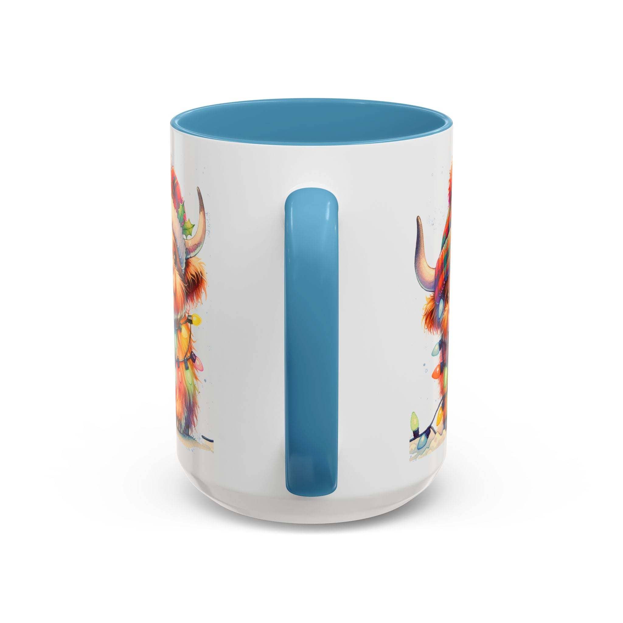 White mug with blue interior and handle, featuring colorful cow design on a white background