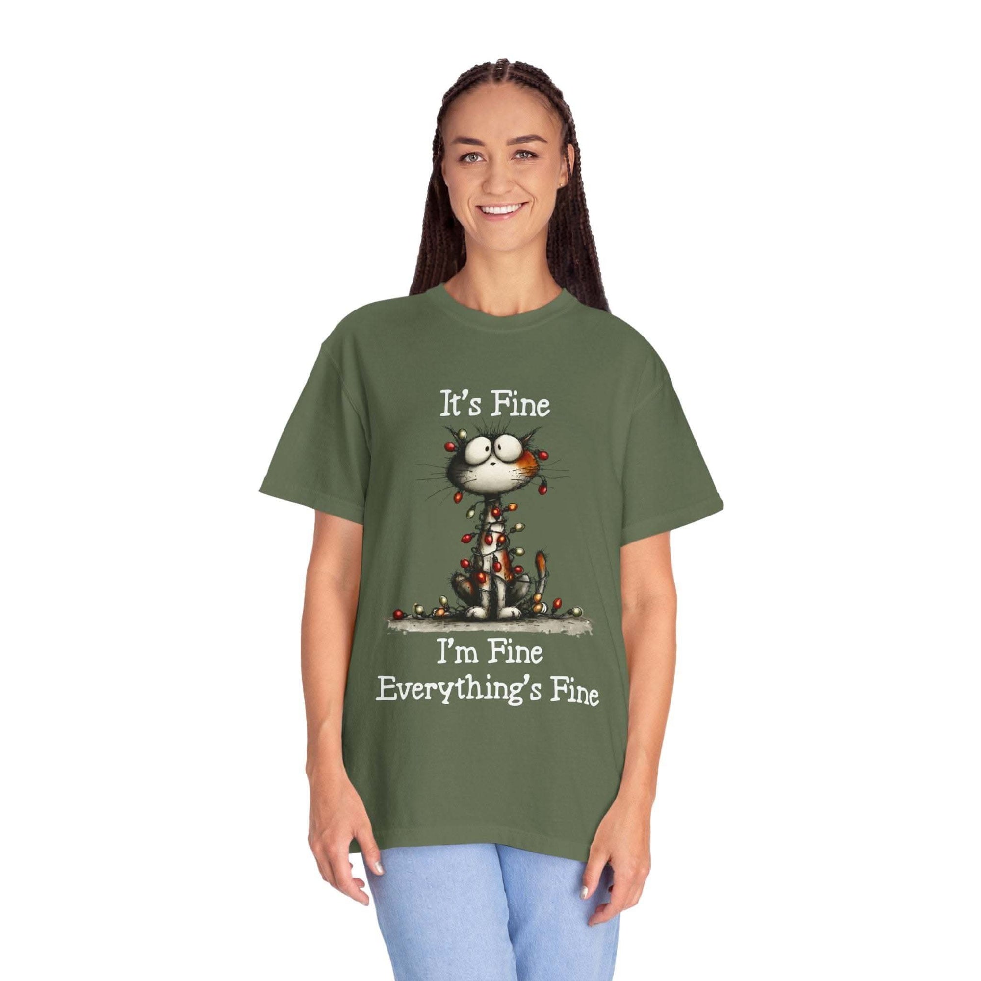 Person wearing a green t-shirt with a graphic and text on a white background