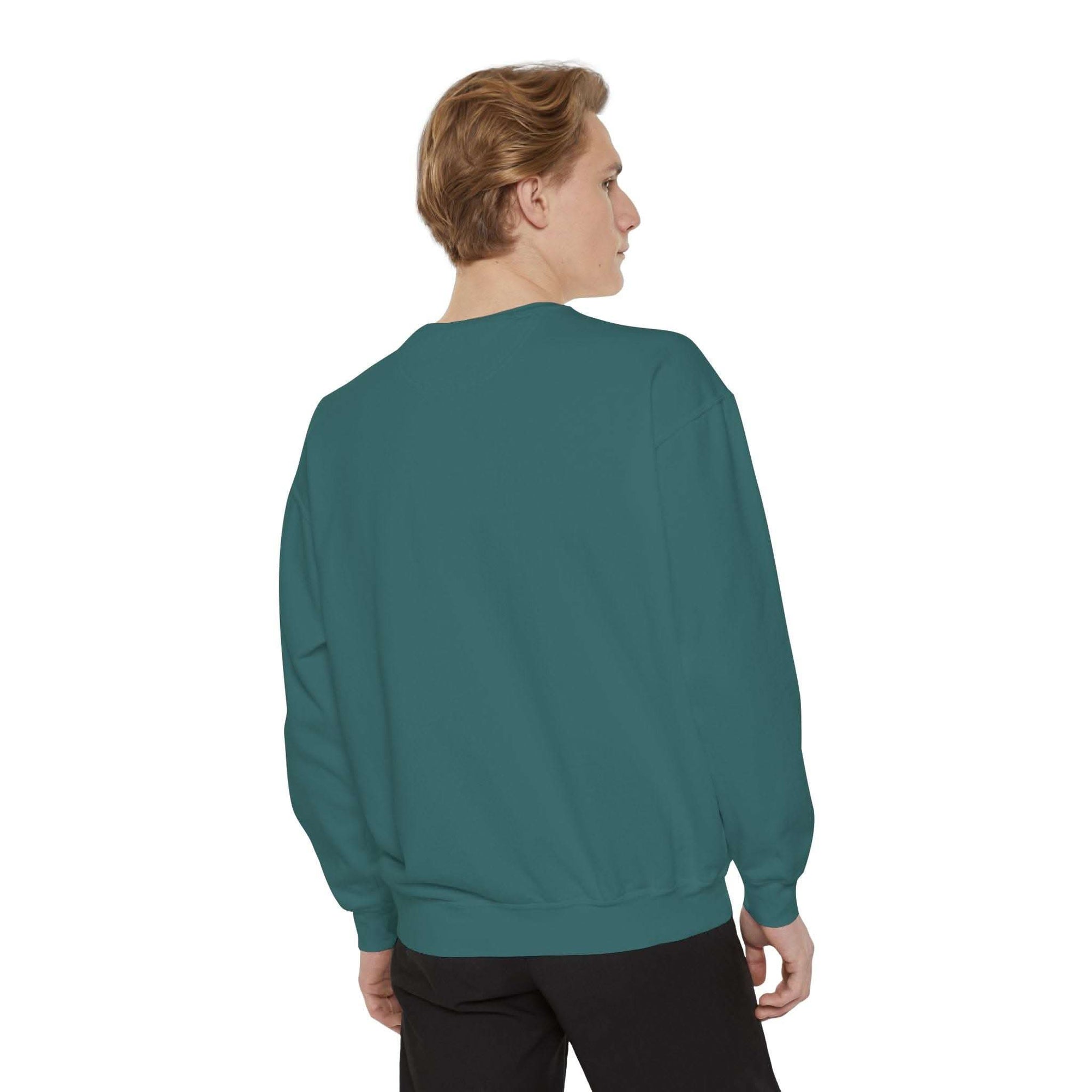 unisex garment-dyed sweatshirt in teal with relaxed fit, perfect cozy holiday wear