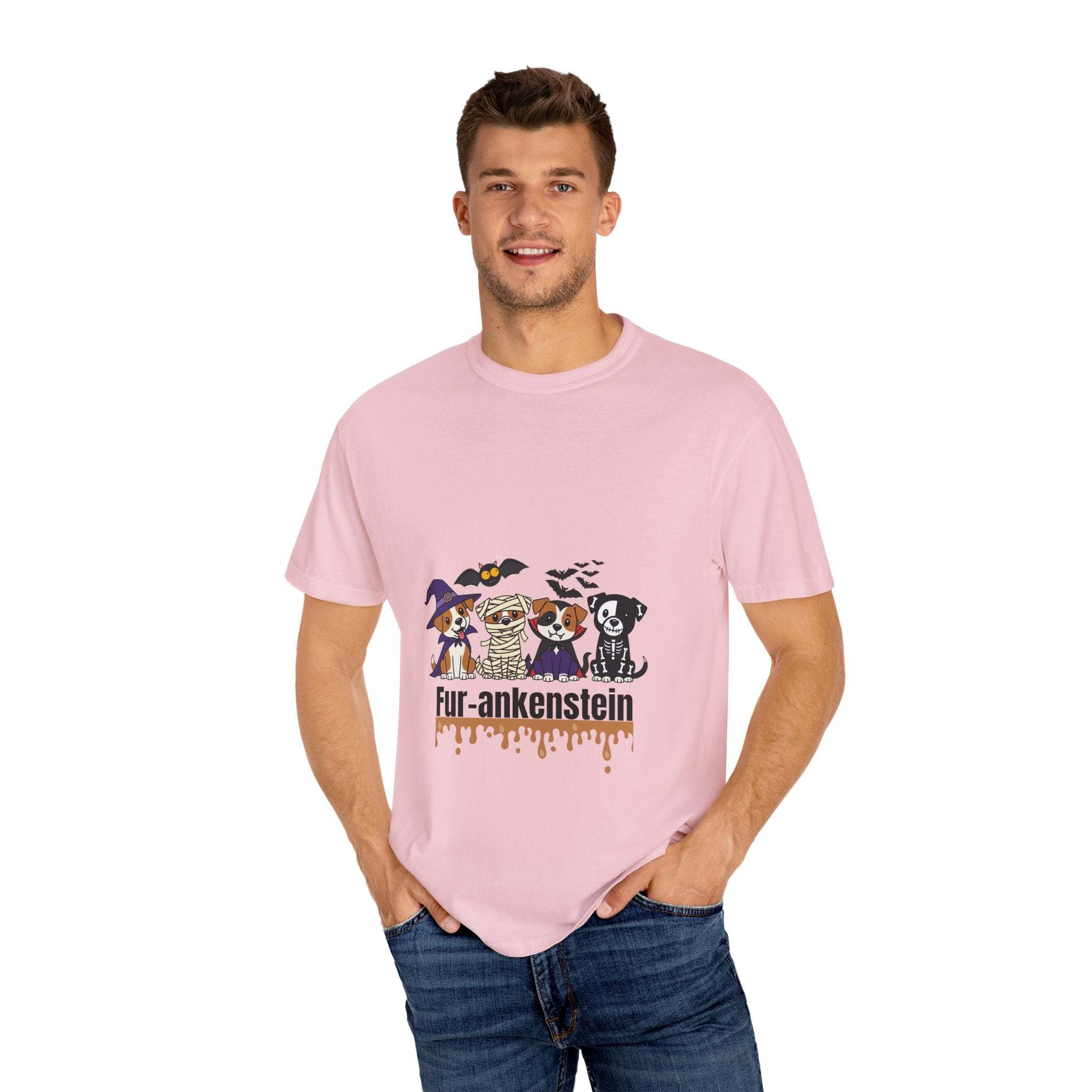 Man wearing pink Puppies Halloween T-shirt with puppies in costumes and "Fur-ankenstein" text