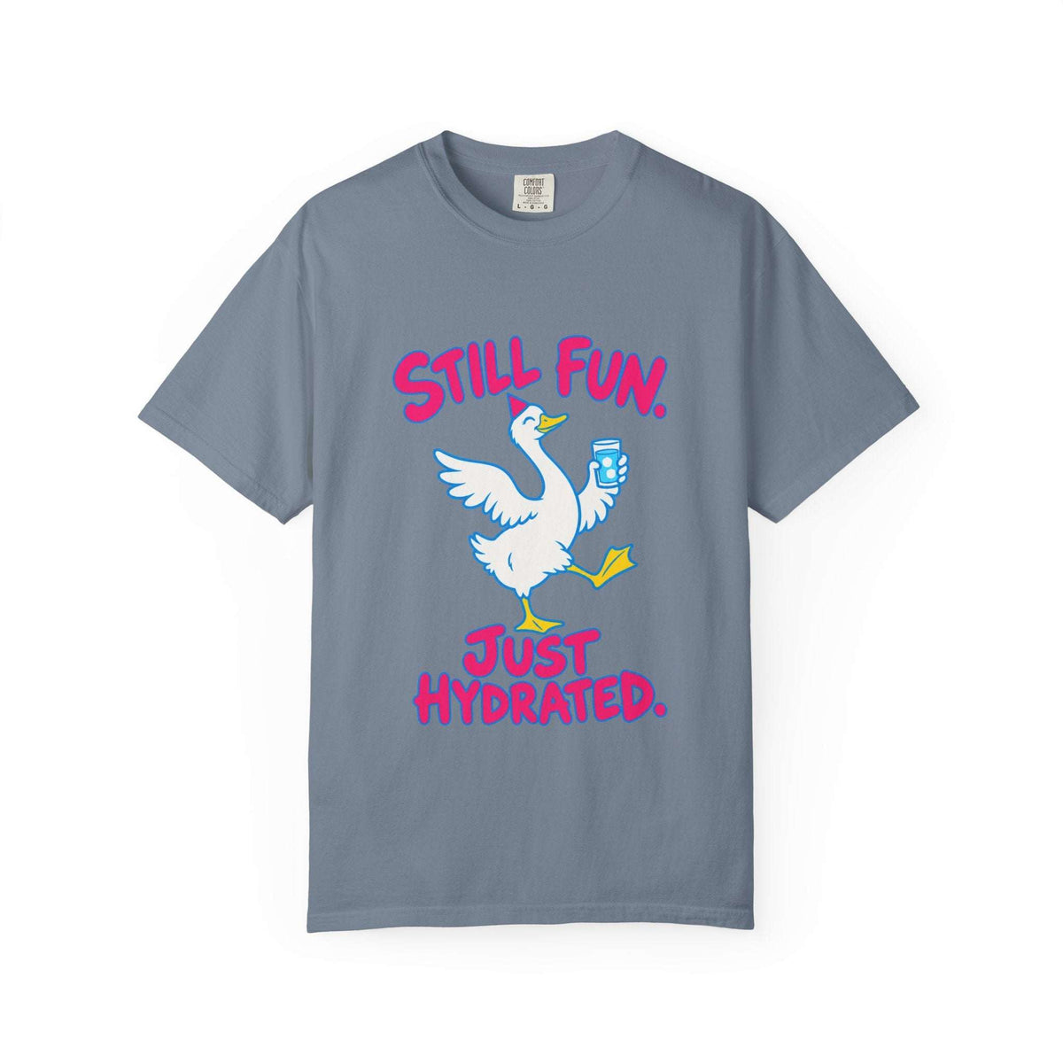 A blue crewneck t-shirt featuring a cartoon graphic of a white goose holding a blue water bottle, with the pink text 'STILL FUN. JUST HYDRATED.