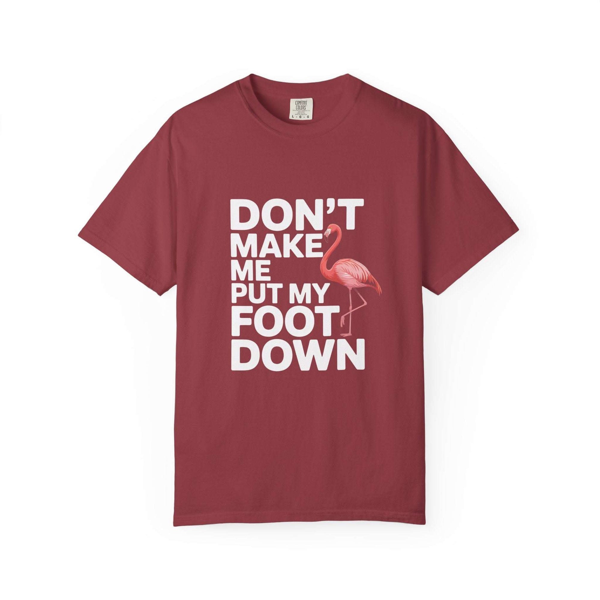 Dont Make Me Put My Foot Down flamingo graphic T-shirt with bold white text on vintage dyed cotton