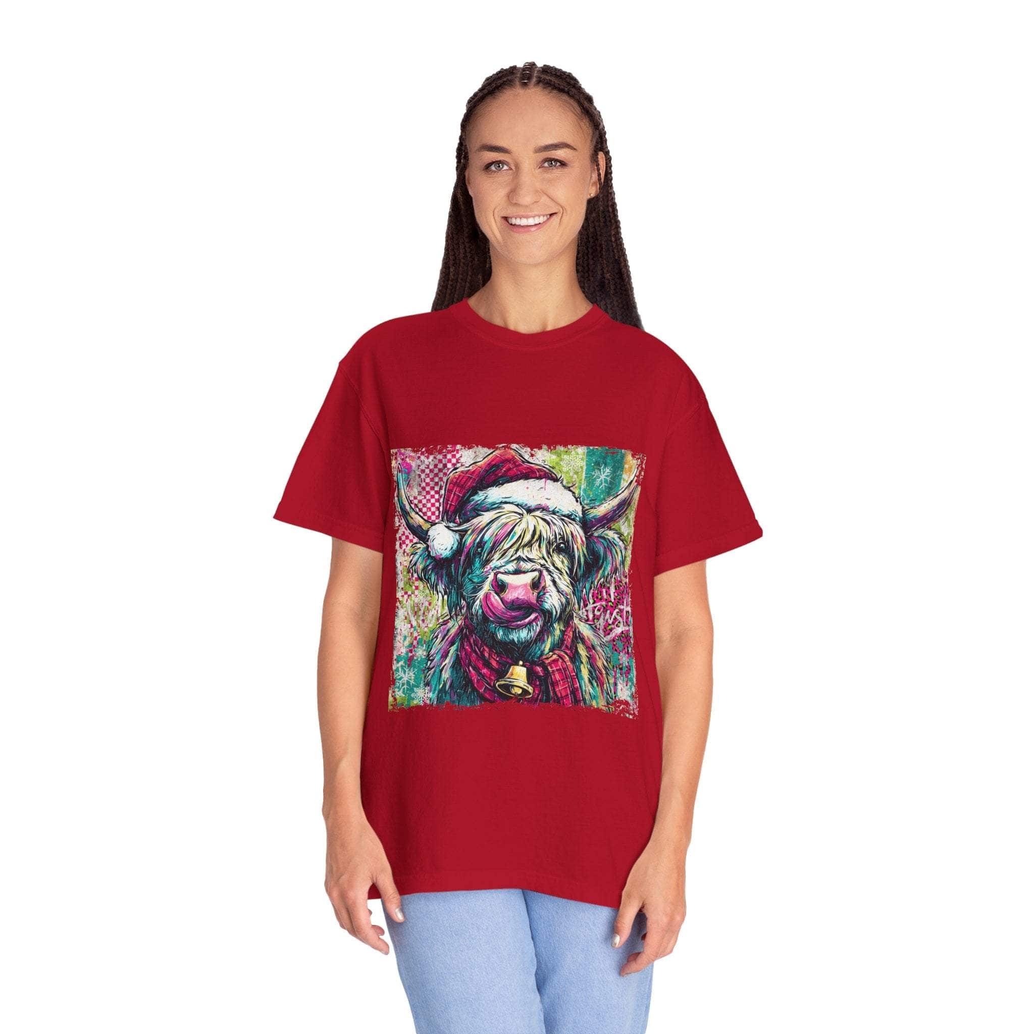 Woman wearing red Retro Santa Highland Cow T-shirt with festive cow graphic and relaxed fit
