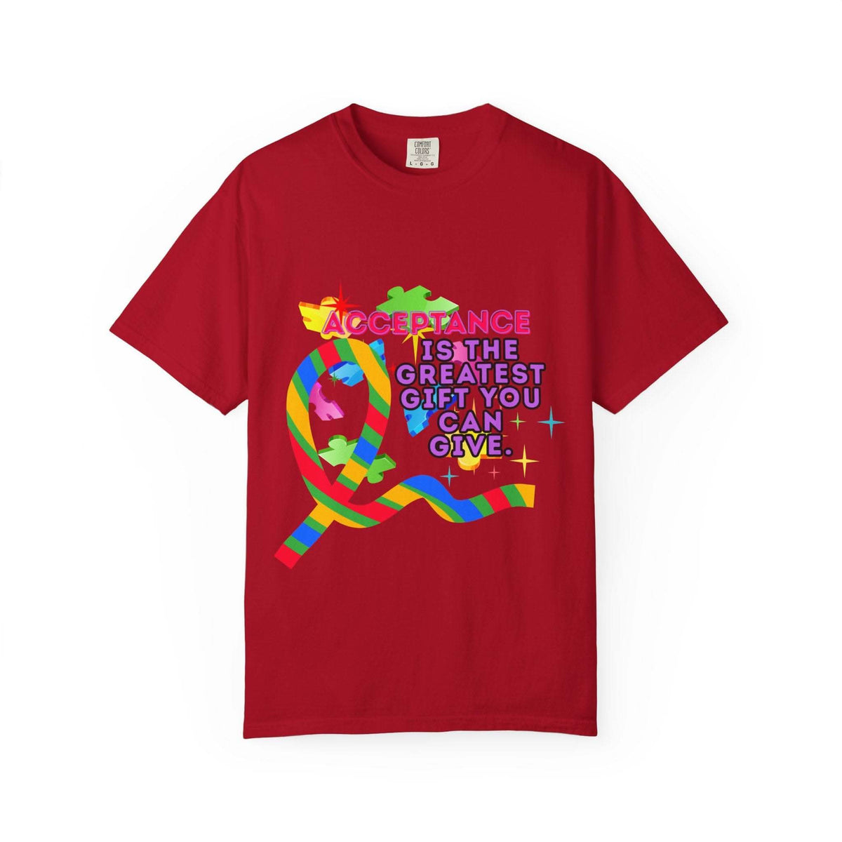 Red garment-dyed T-shirt with colorful Autism Acceptance ribbon and message promoting inclusivity and awareness