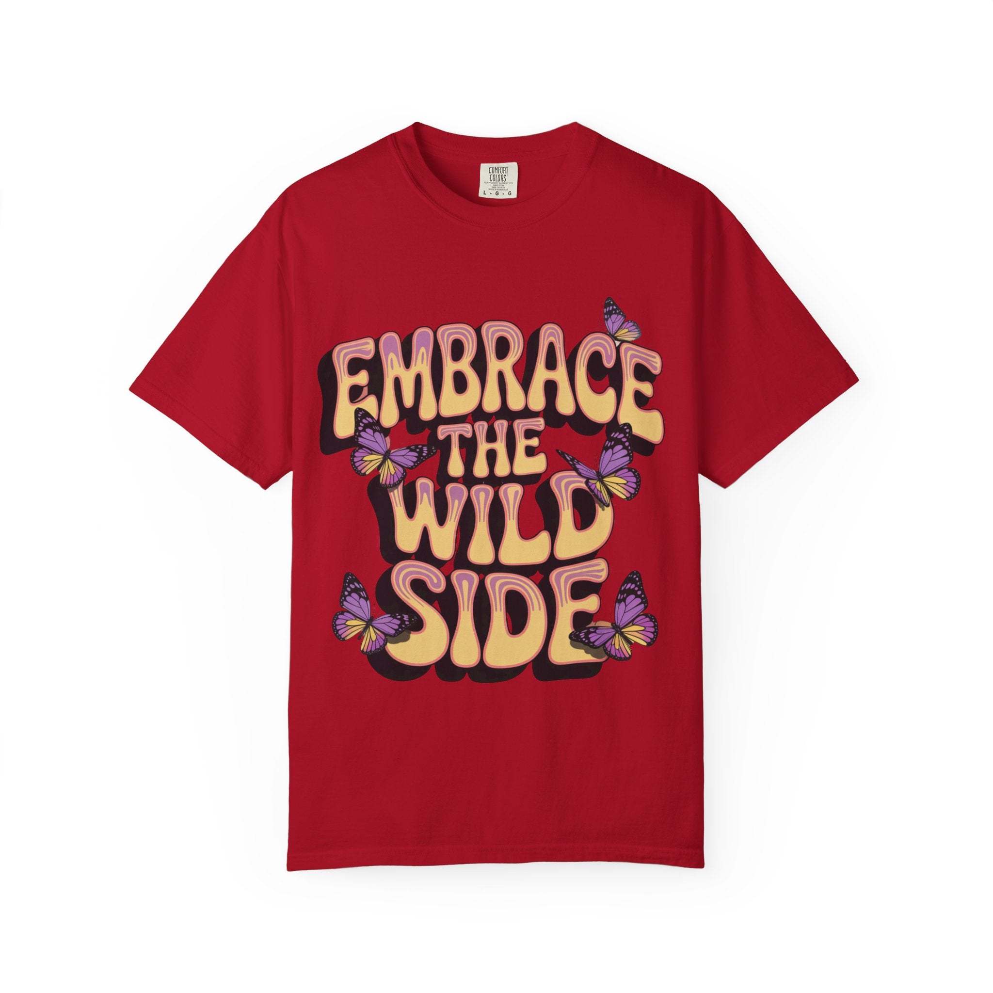 Red garment-dyed T-shirt with "Embrace the Wild Side" text and butterfly print, made of 100% cotton, unisex.