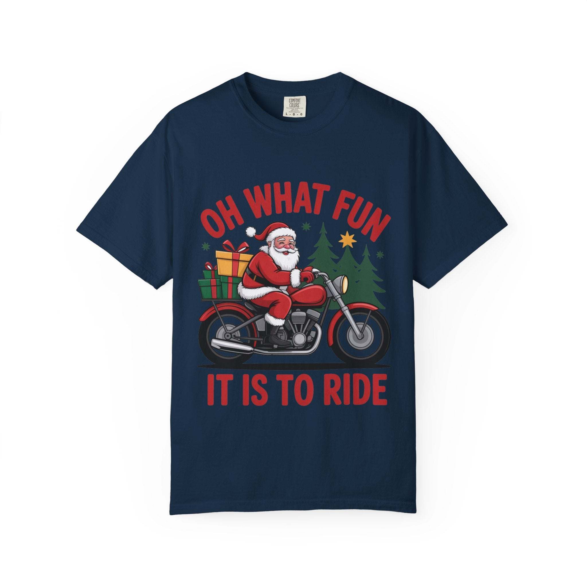 Christmas t-shirt featuring Santa on a motorcycle with gifts and festive trees, navy blue background