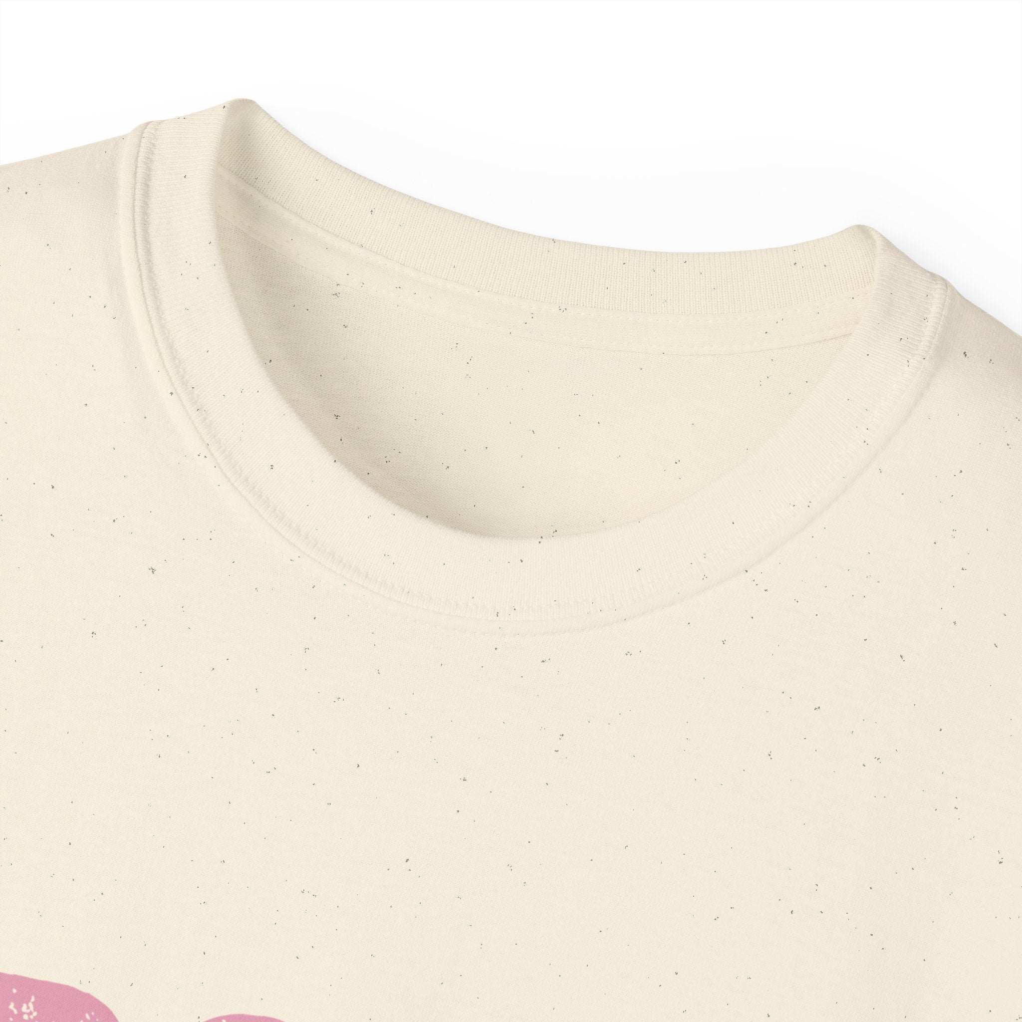 Close-up of cream-colored Distressed Frosty T-Shirt neckline made from 100% US cotton with subtle speckled pattern