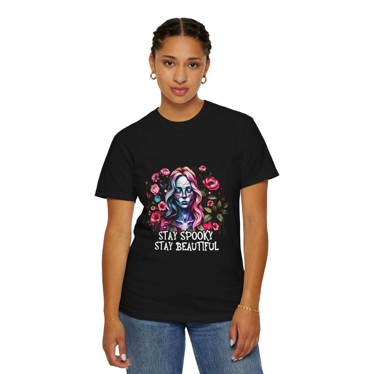 Woman wearing black Floral Skeleton T-shirt with colorful spooky skeleton and floral print, relaxed fit style