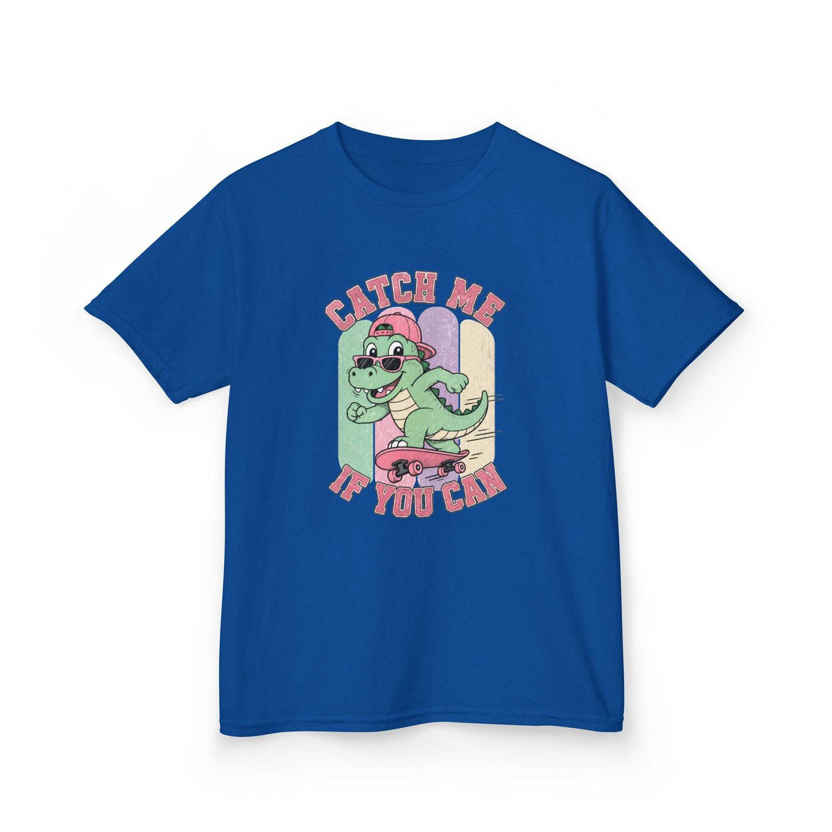 A royal blue short-sleeve t-shirt with a colorful cartoon graphic of a green dinosaur riding a pink skateboard, with the text 'CATCH ME IF YOU CAN' in pink arched lettering.
