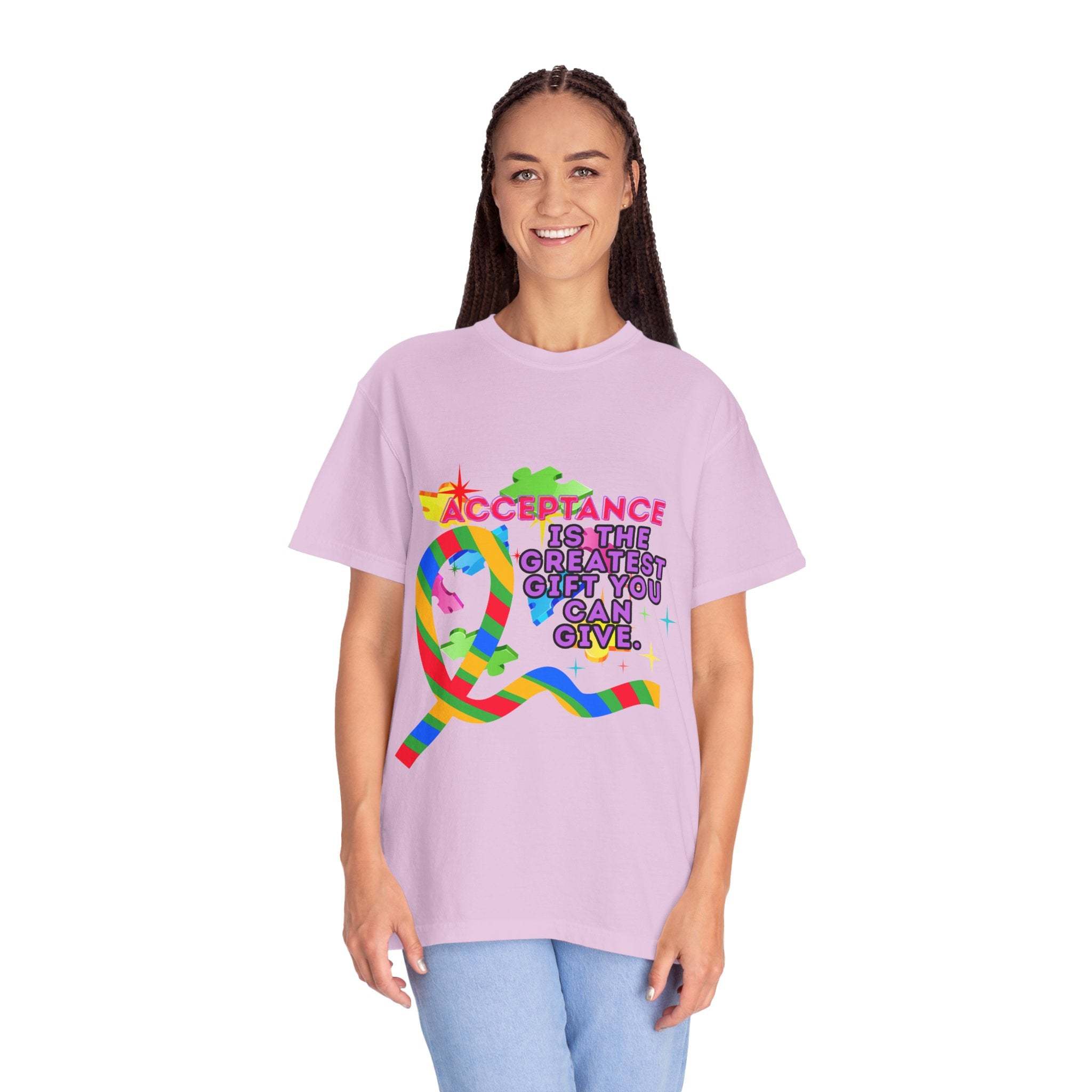 Woman wearing lavender garment-dyed T-shirt with colorful Autism Acceptance ribbon and message promoting inclusivity and awareness
