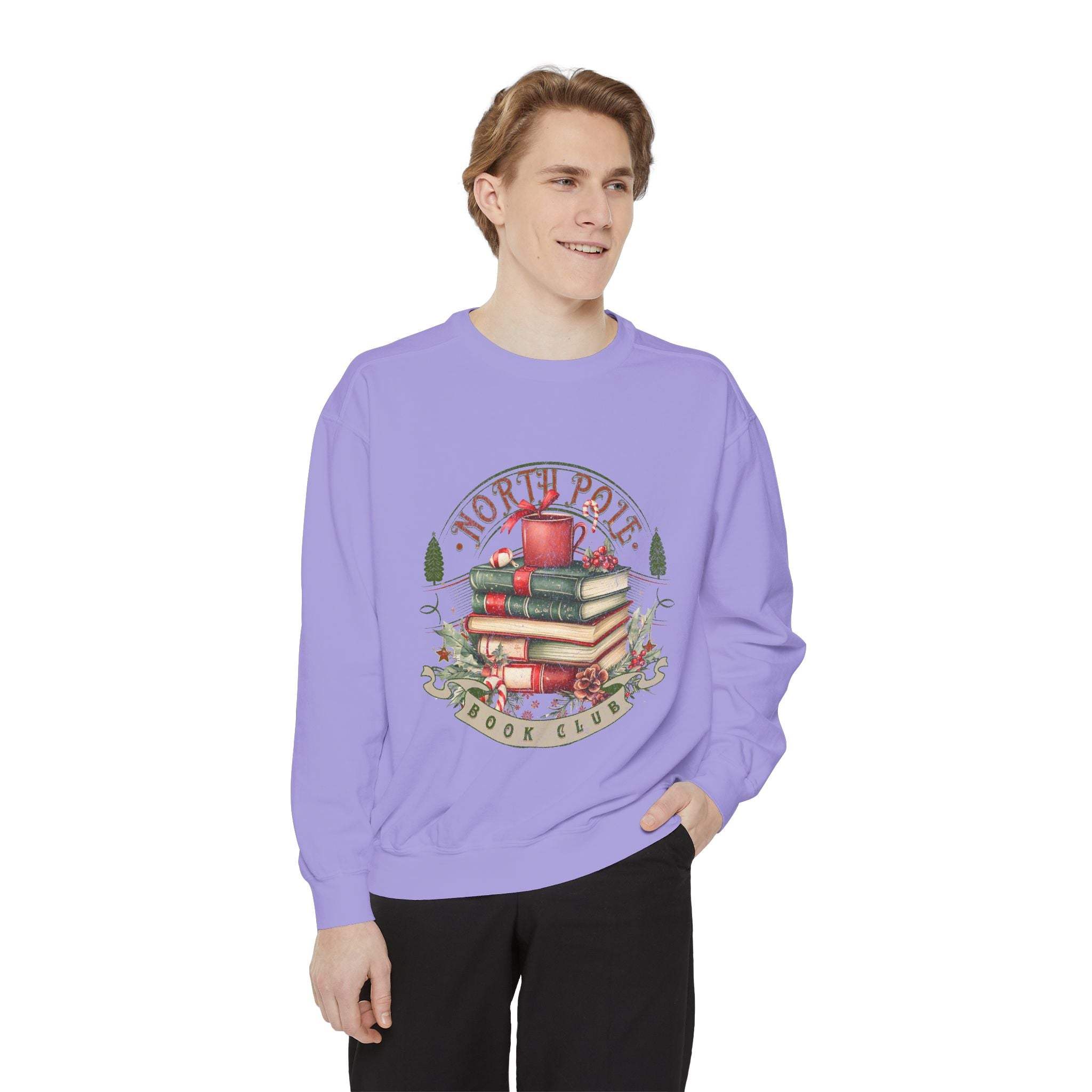 Man wearing vintage North Pole Book Club sweatshirt with holiday book stack design