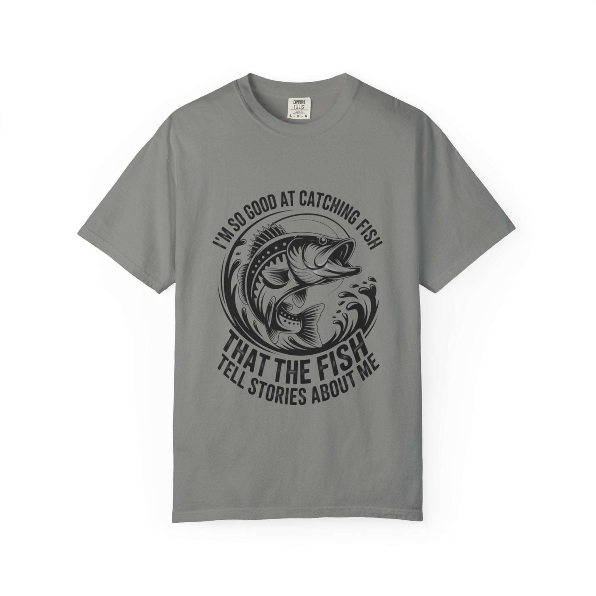 Fishing T-shirt with humorous "So Good At Catching Fish That The Fish Tell Stories About Me" text, soft cotton tee for anglers
