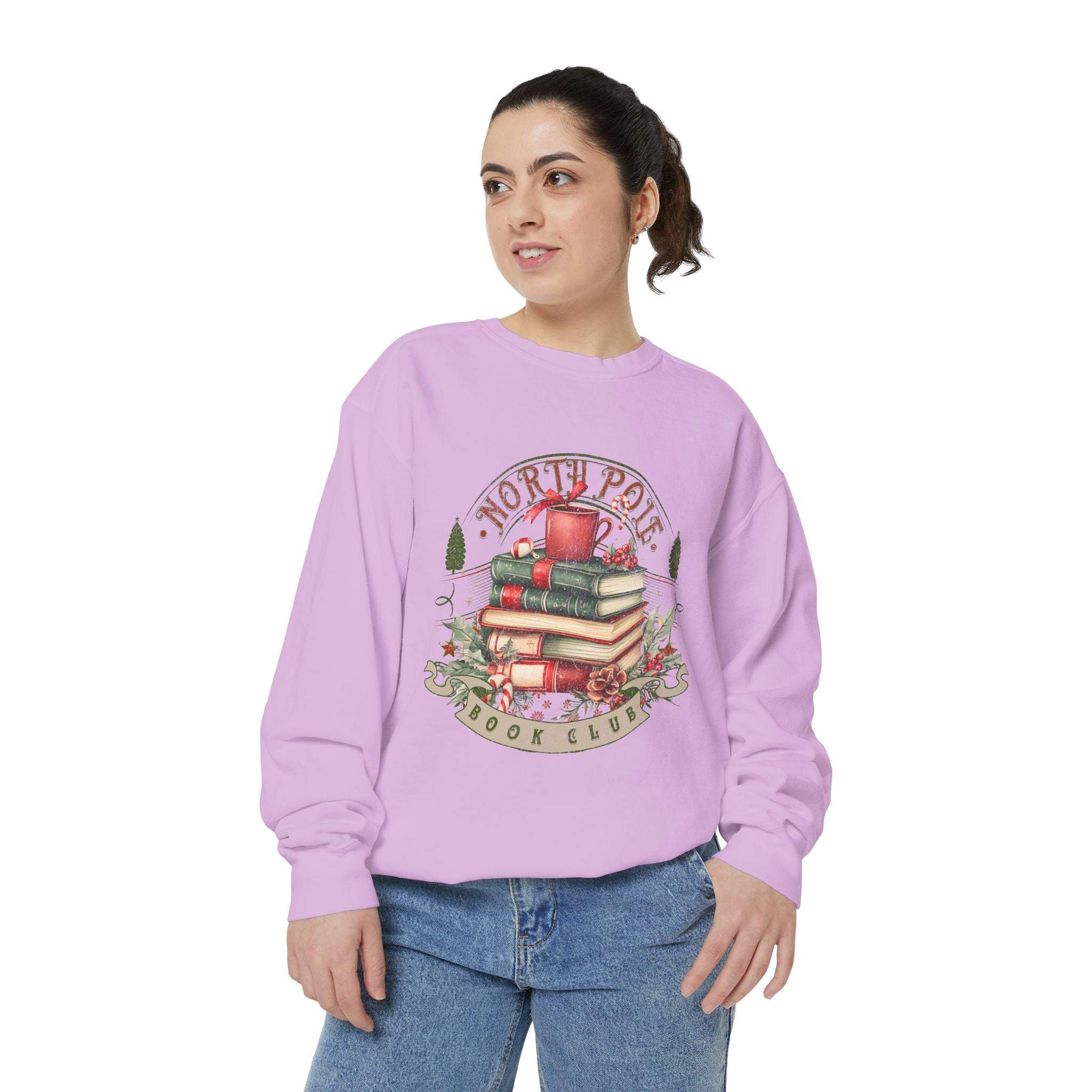 Woman wearing vintage North Pole Book Club sweatshirt with book and holiday design