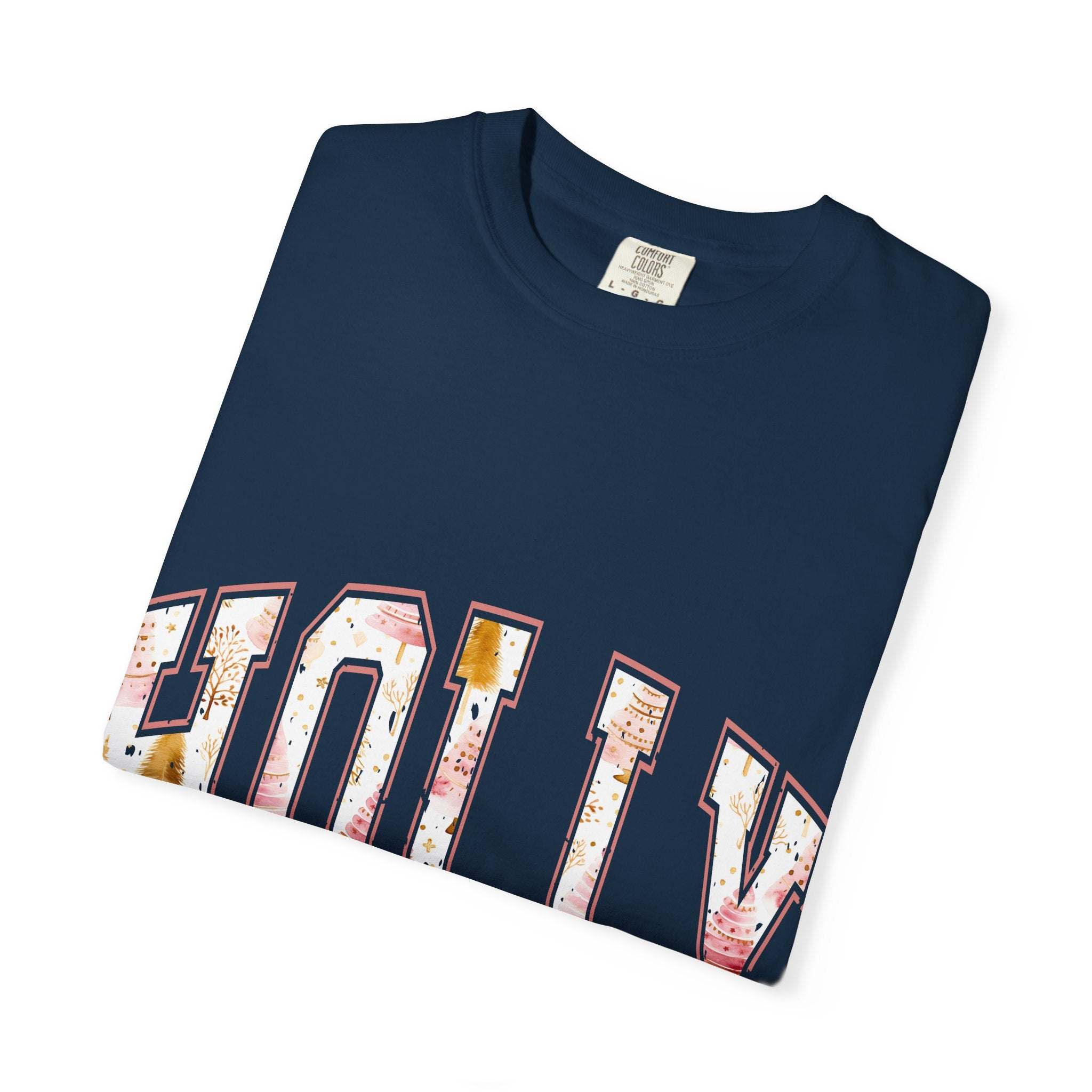 Folded navy blue Varsity Holly Jolly T-shirt with festive lettering and garment-dyed fabric