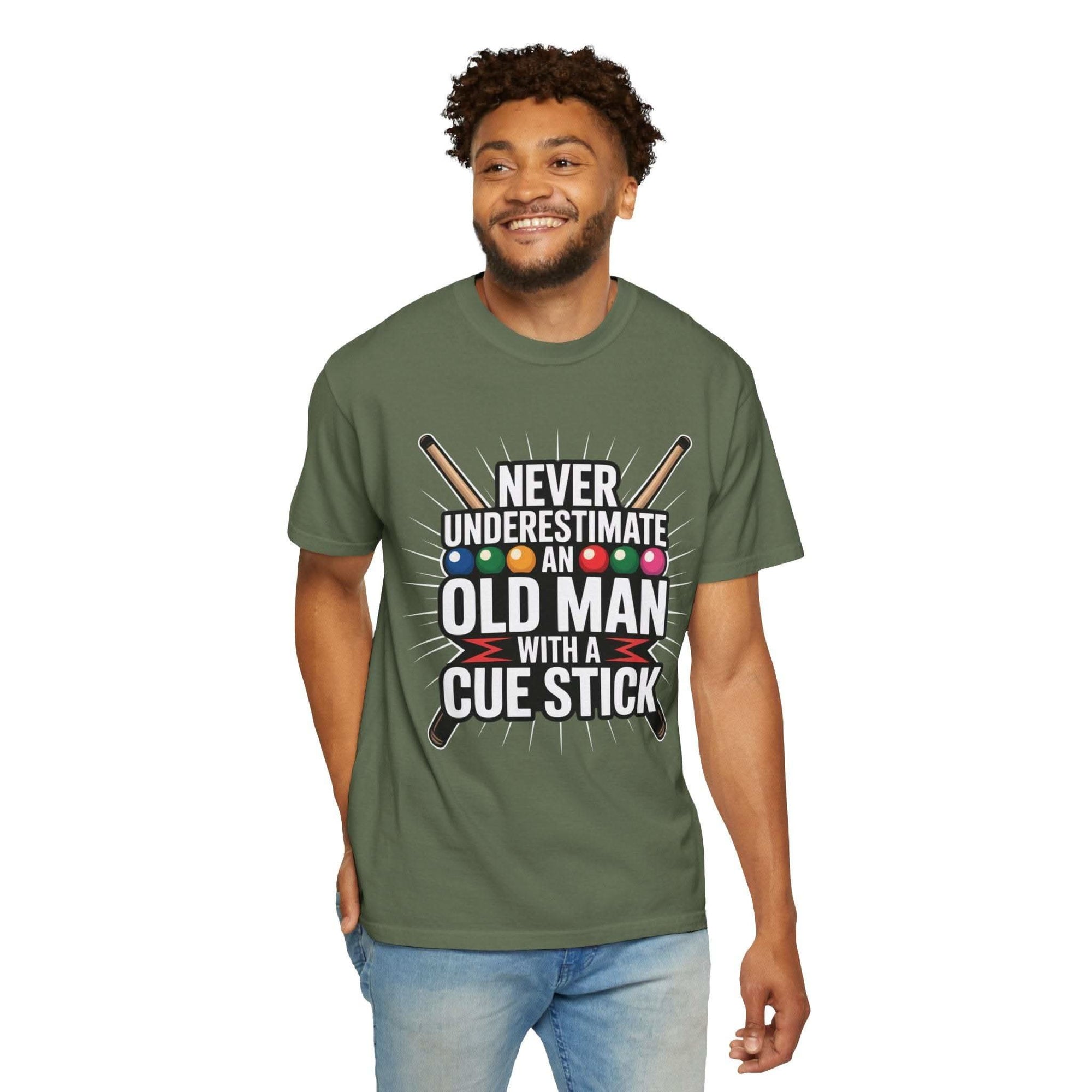 Man wearing green Never Underestimate An Old Man With A Pool Cue t-shirt with pool balls and cues design