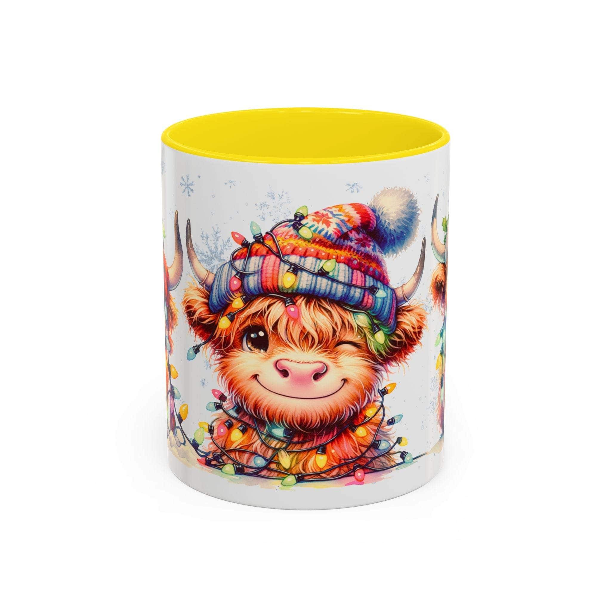 Mug with a cartoon Highland cow wearing a colorful hat and surrounded by lights on a white background