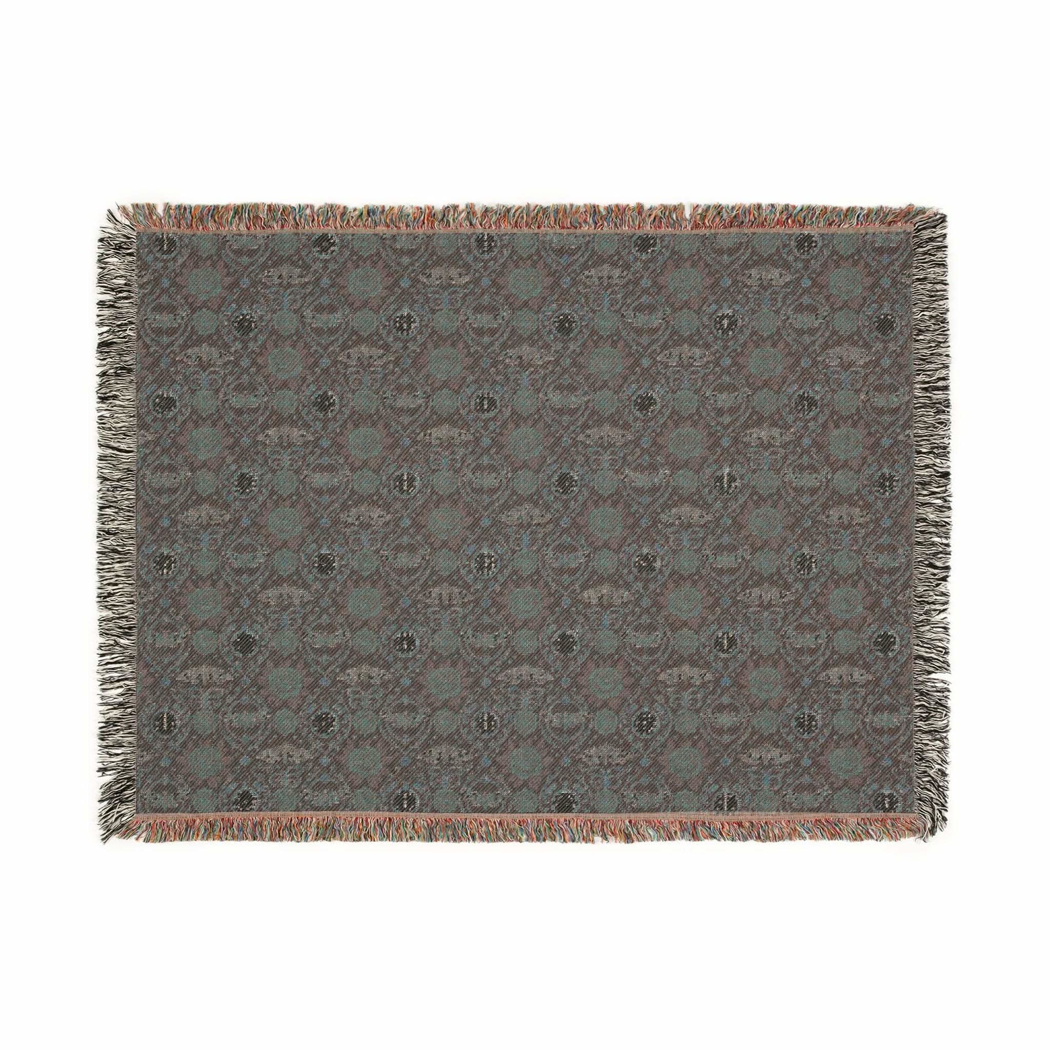 Victorian Gothmas Woven Blanket with candlelight-inspired dark and crimson hues and colorful fringed edges