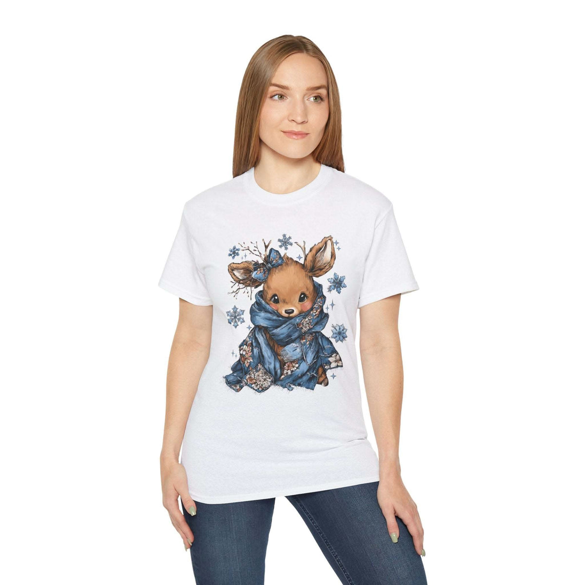 White t-shirt with retro patchwork reindeer design wearing blue scarf and surrounded by snowflakes