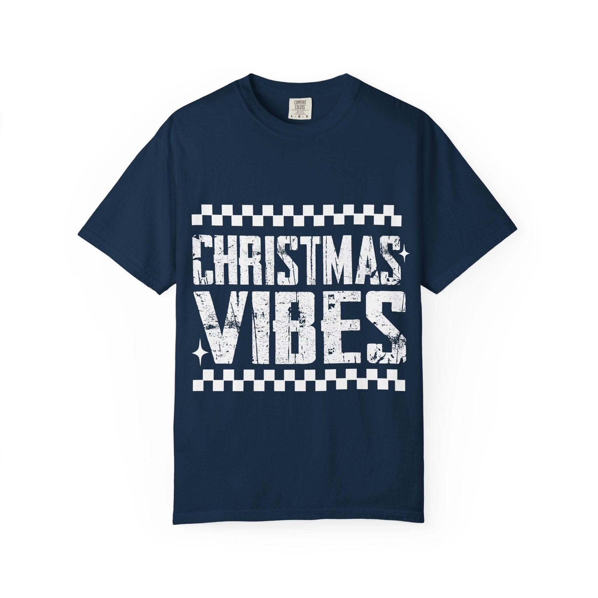 Distressed Christmas Vibes garment-dyed vintage holiday T-shirt with faded distressed graphics and soft muted tones