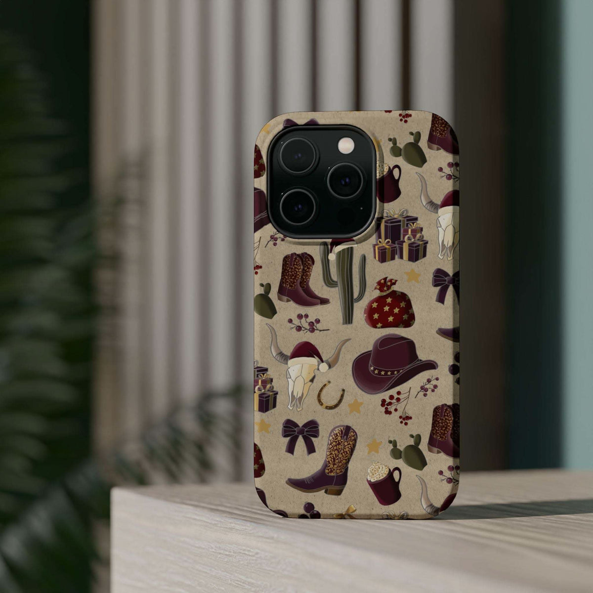 Cowboy Christmas design phone case for iPhone 17 in glossy finish by Printify, featuring festive colors and patterns.